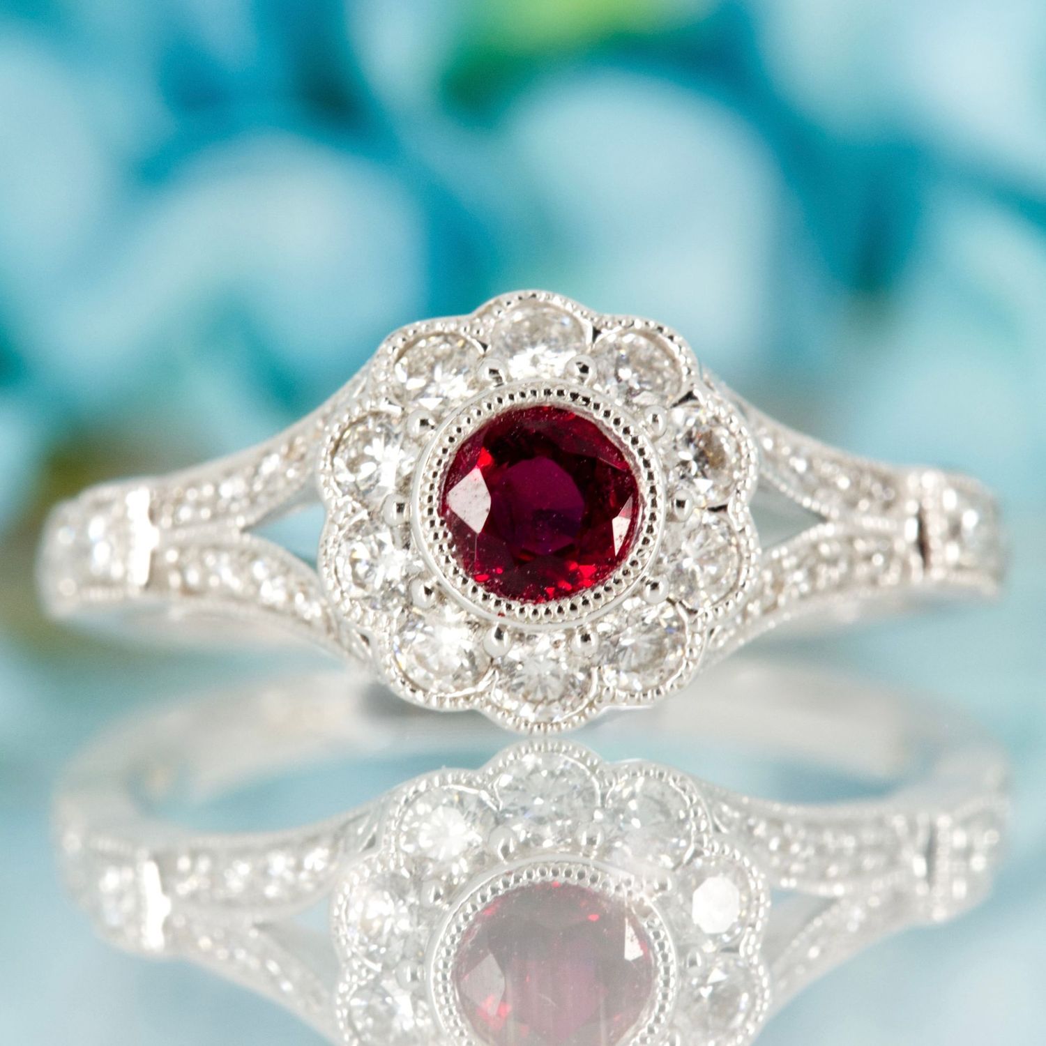 18ct White Gold Round Cut Ruby & Diamond Flower Cluster Ring 18ct White Gold Round Cut Ruby & Diamond Flower Cluster Ring