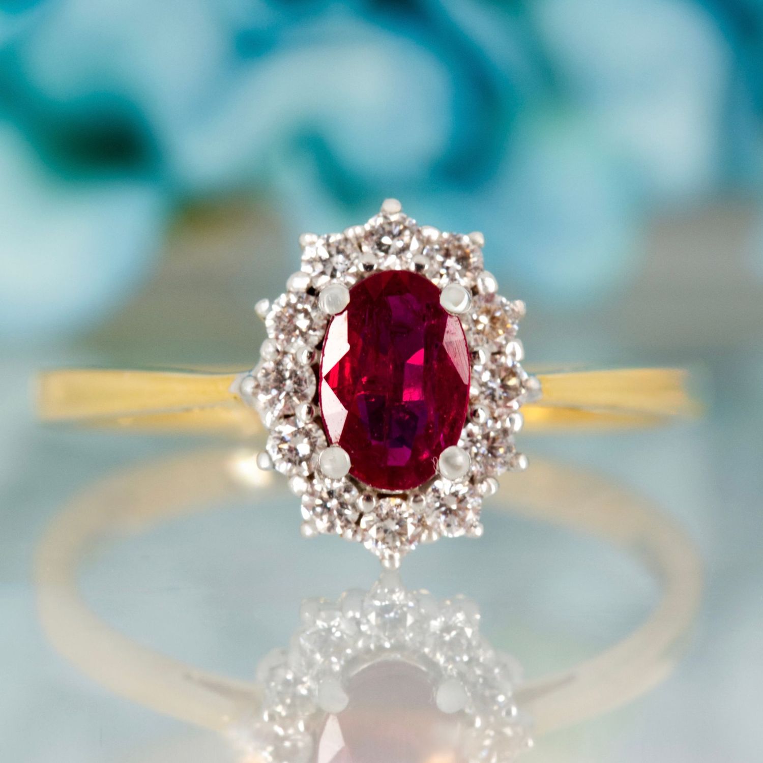 18ct Yellow Gold Oval Cut Ruby & Round Brilliant Cut Diamond Cluster Ring