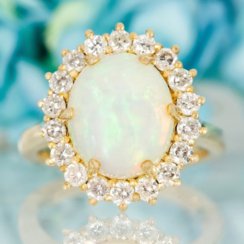 9ct Yellow Gold Oval Shaped Opal & Round Brilliant Cut Diamond Cluster Ring