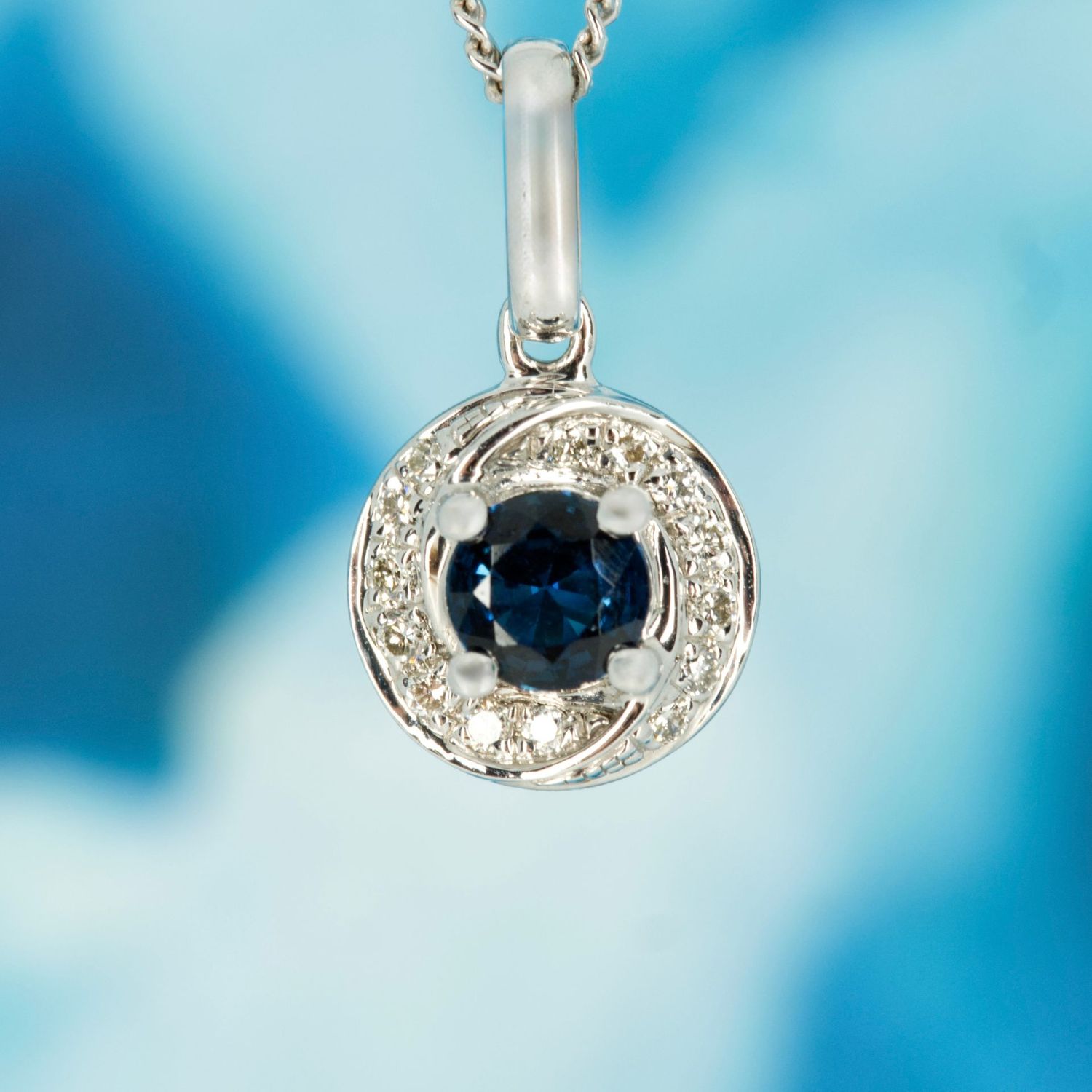 Pre-Loved 9ct White Gold Round Cut Sapphire & Diamond Swirl Pendant & Chain