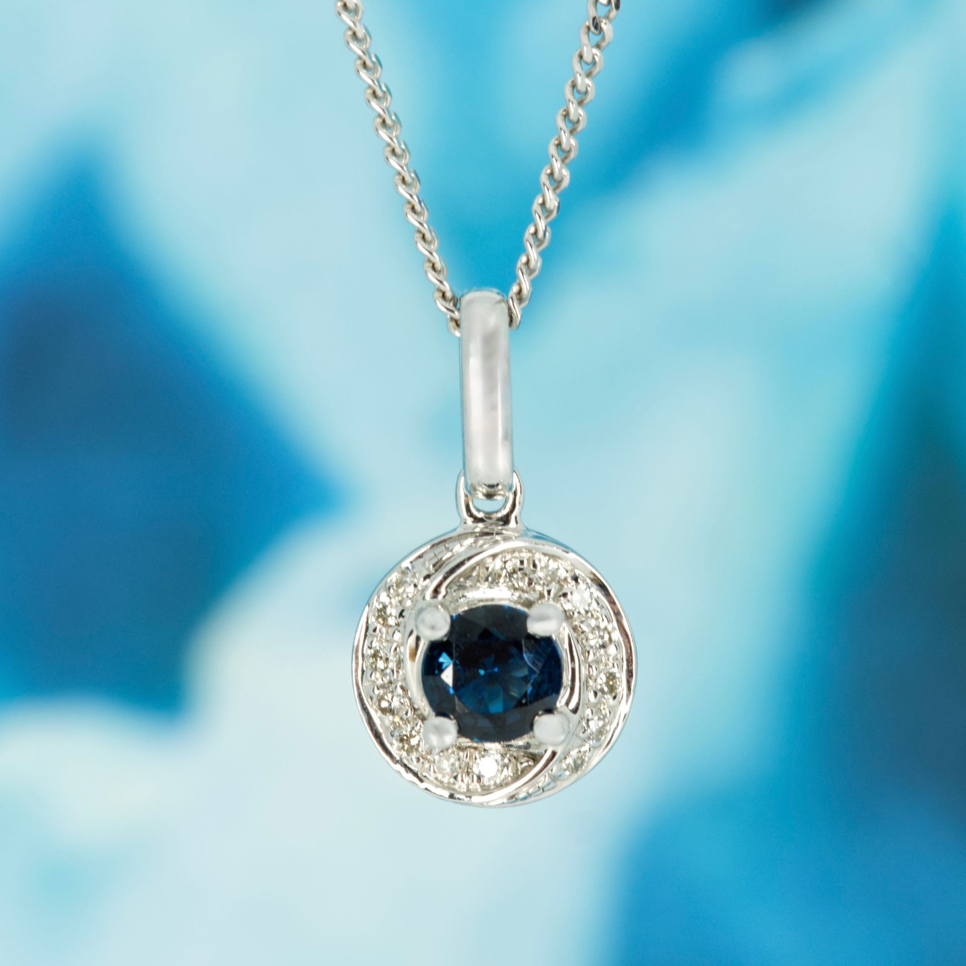 Pre-Loved 9ct White Gold Round Cut Sapphire & Diamond Swirl Pendant & Chain