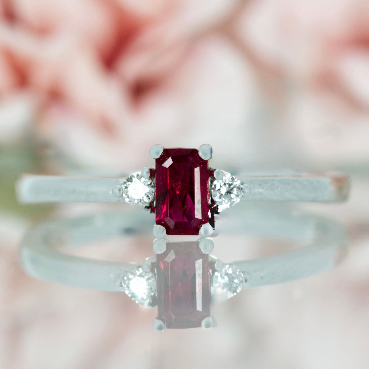 18ct White Gold Octagonal Cut Ruby & Round Brilliant Cut Diamond Trilogy Ring