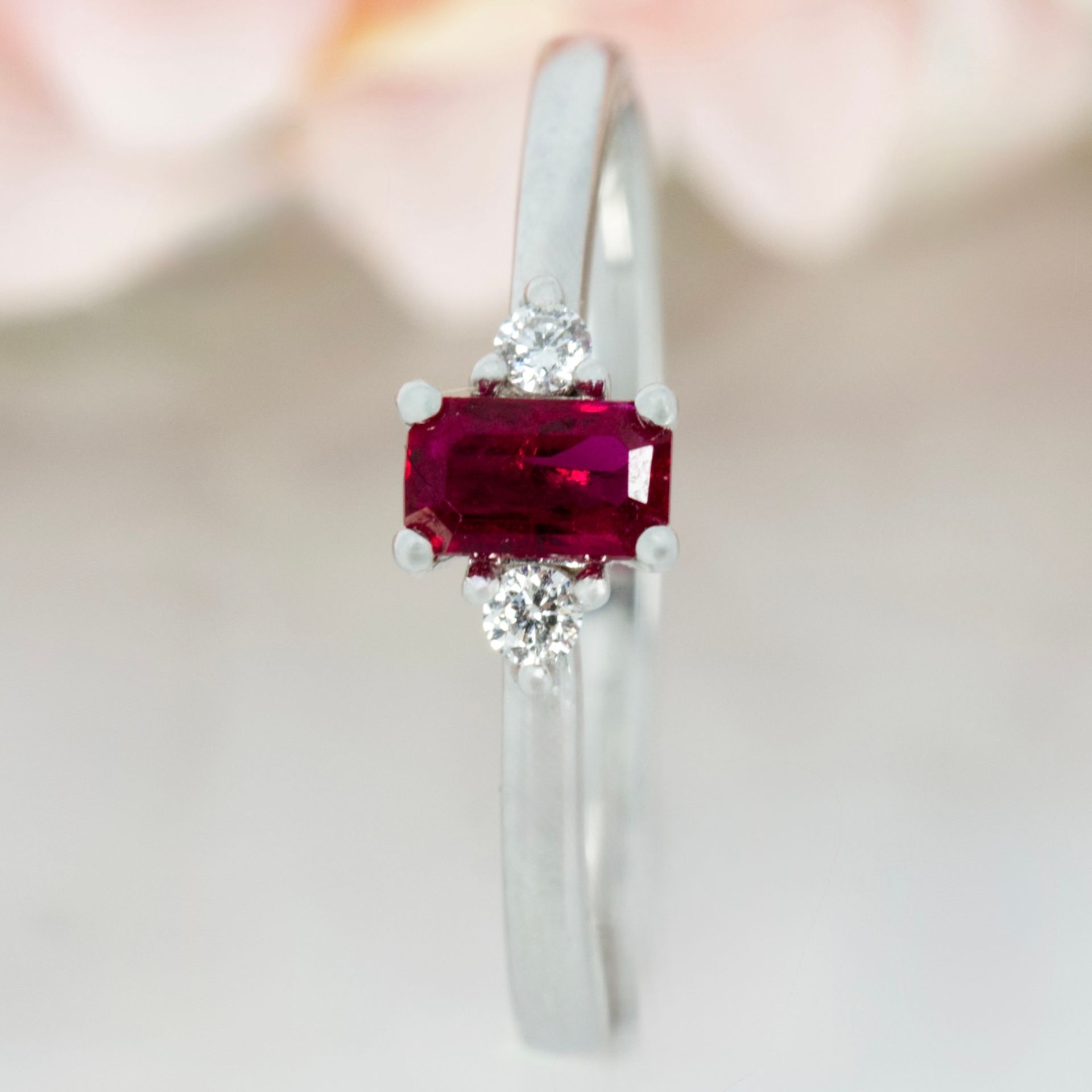 18ct White Gold Octagonal Cut Ruby & Round Brilliant Cut Diamond Trilogy Ring