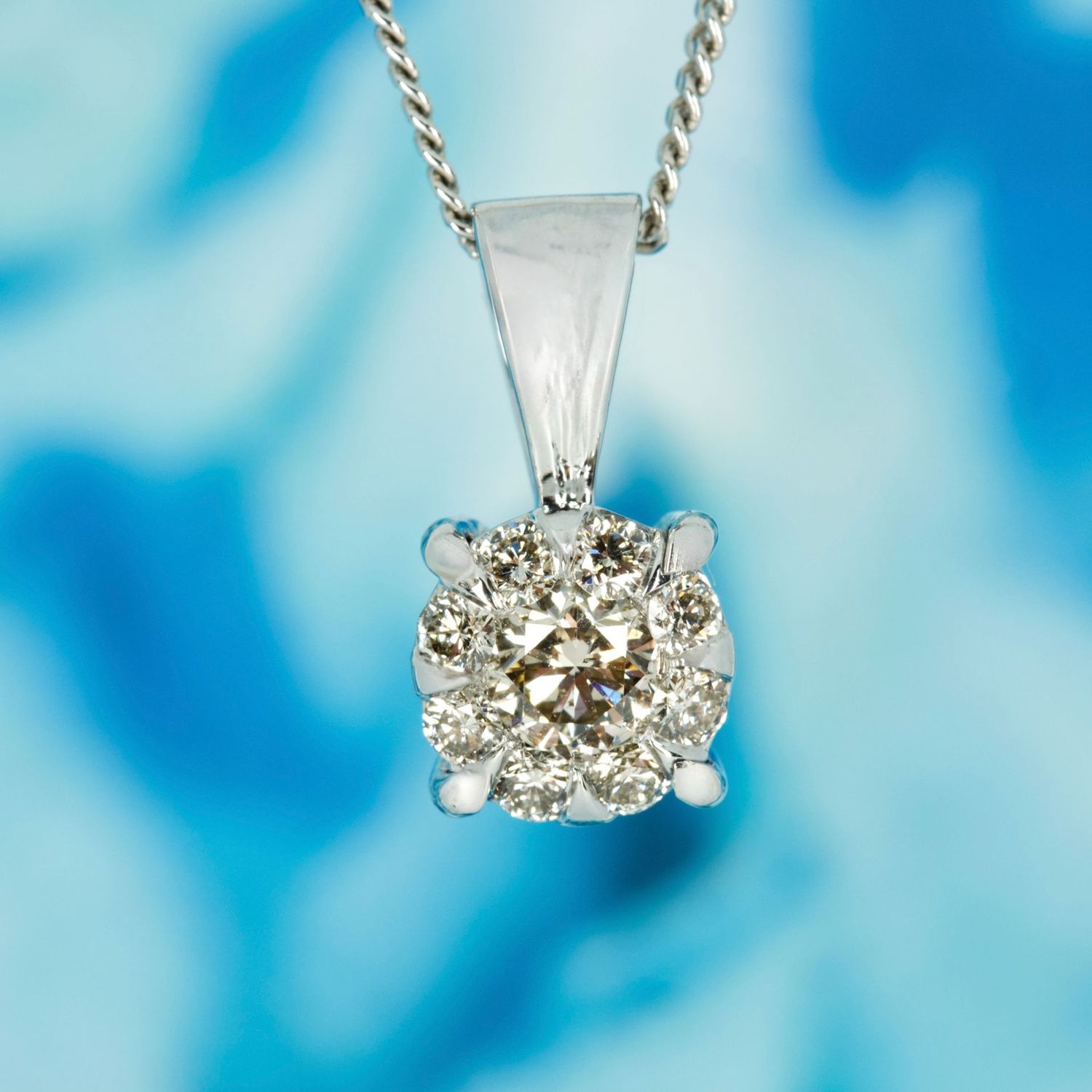 Pre-Loved 9ct White Gold 0.57ct Approx Round Brilliant Cut Diamond Cluster Pendant & Chain