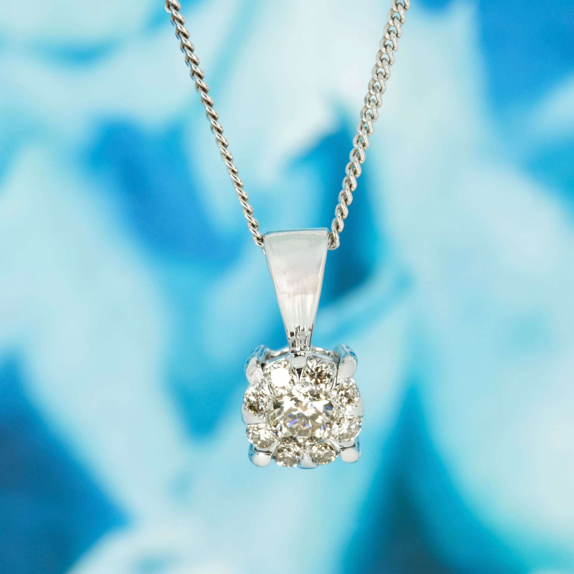 Pre-Loved 9ct White Gold 0.57ct Approx Round Brilliant Cut Diamond Cluster Pendant & Chain