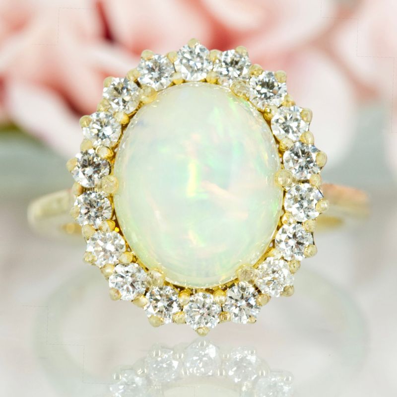9ct Yellow Gold Oval Cabochon Opal & Round Brilliant Cut Diamond Cluster Ring