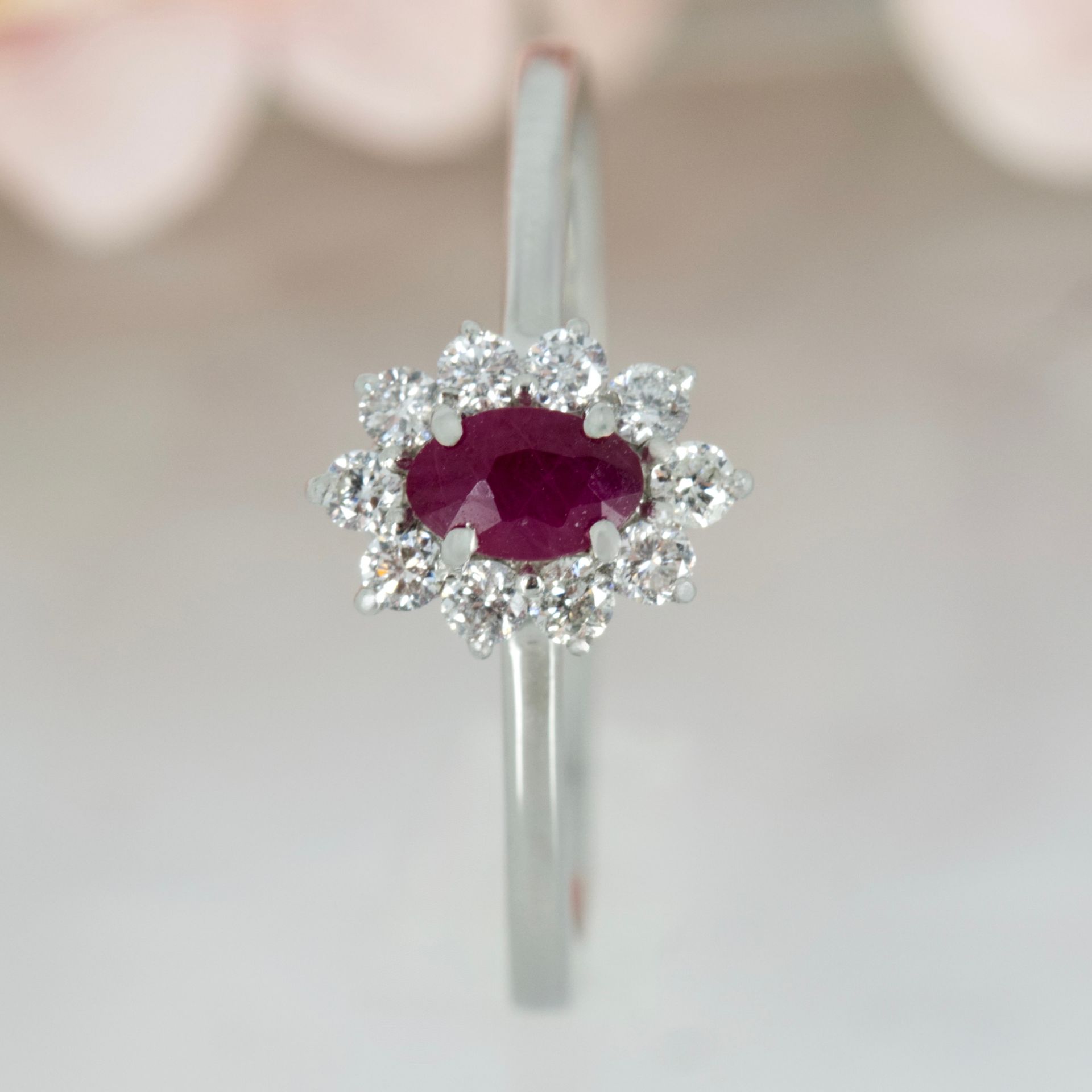 Platinum Oval Cut Ruby & Round Brilliant Cut Diamond Cluster Ring