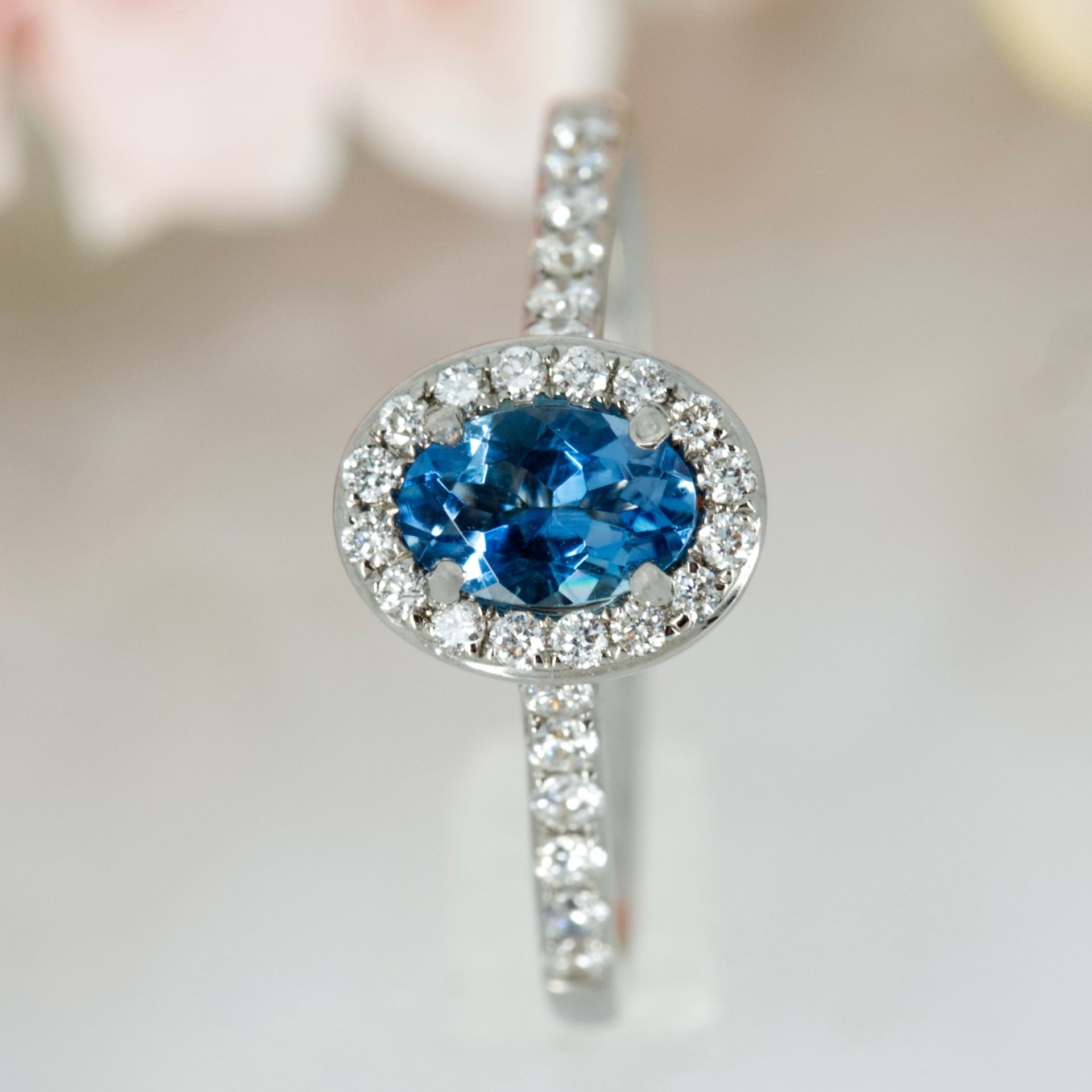 18ct White Gold Oval Cut Aquamarine & Round Brilliant Cut Diamond Halo Cluster Ring