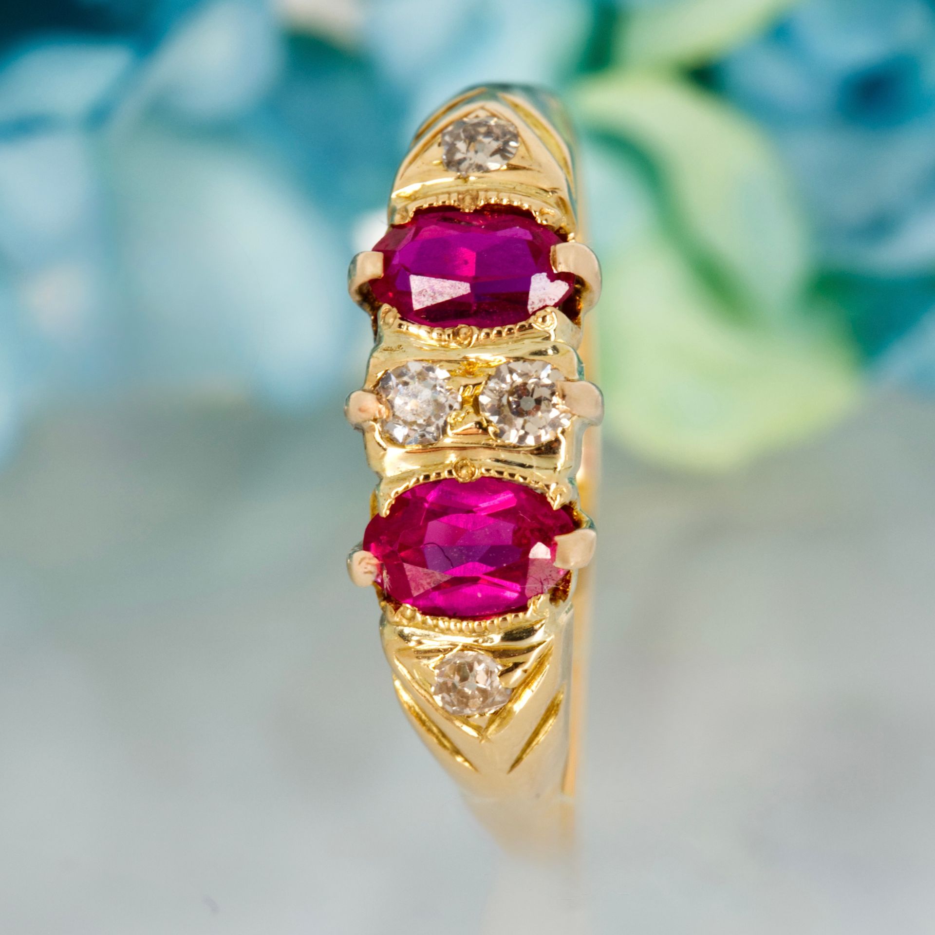 Pre-Loved 18ct Yellow Gold Oval Cut Ruby & Round Brilliant Cut Diamond Dress Ring