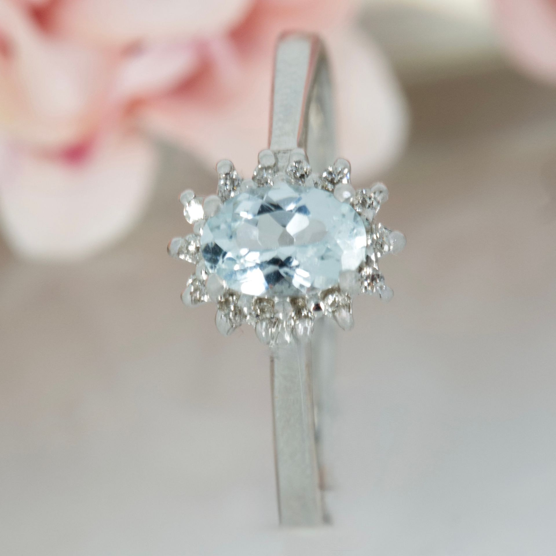 9ct White Gold Oval Cut Aquamarine & Round Brilliant Cut Diamond Cluster Ring
