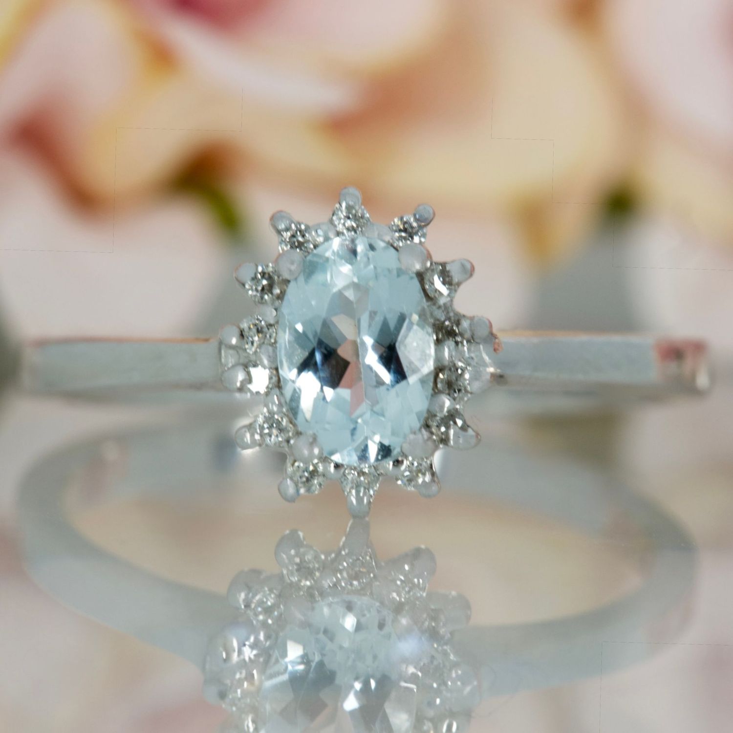 9ct White Gold Oval Cut Aquamarine & Round Brilliant Cut Diamond Cluster Ring