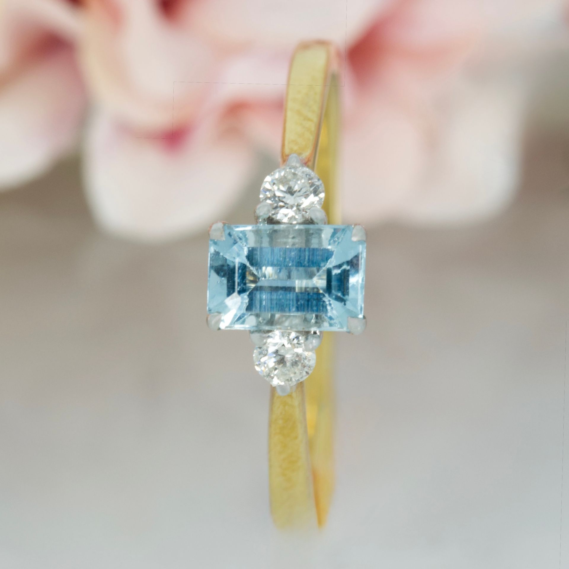 18ct Yellow Gold Octagonal Cut Aquamarine & Round Brilliant Cut Diamond Trilogy Ring