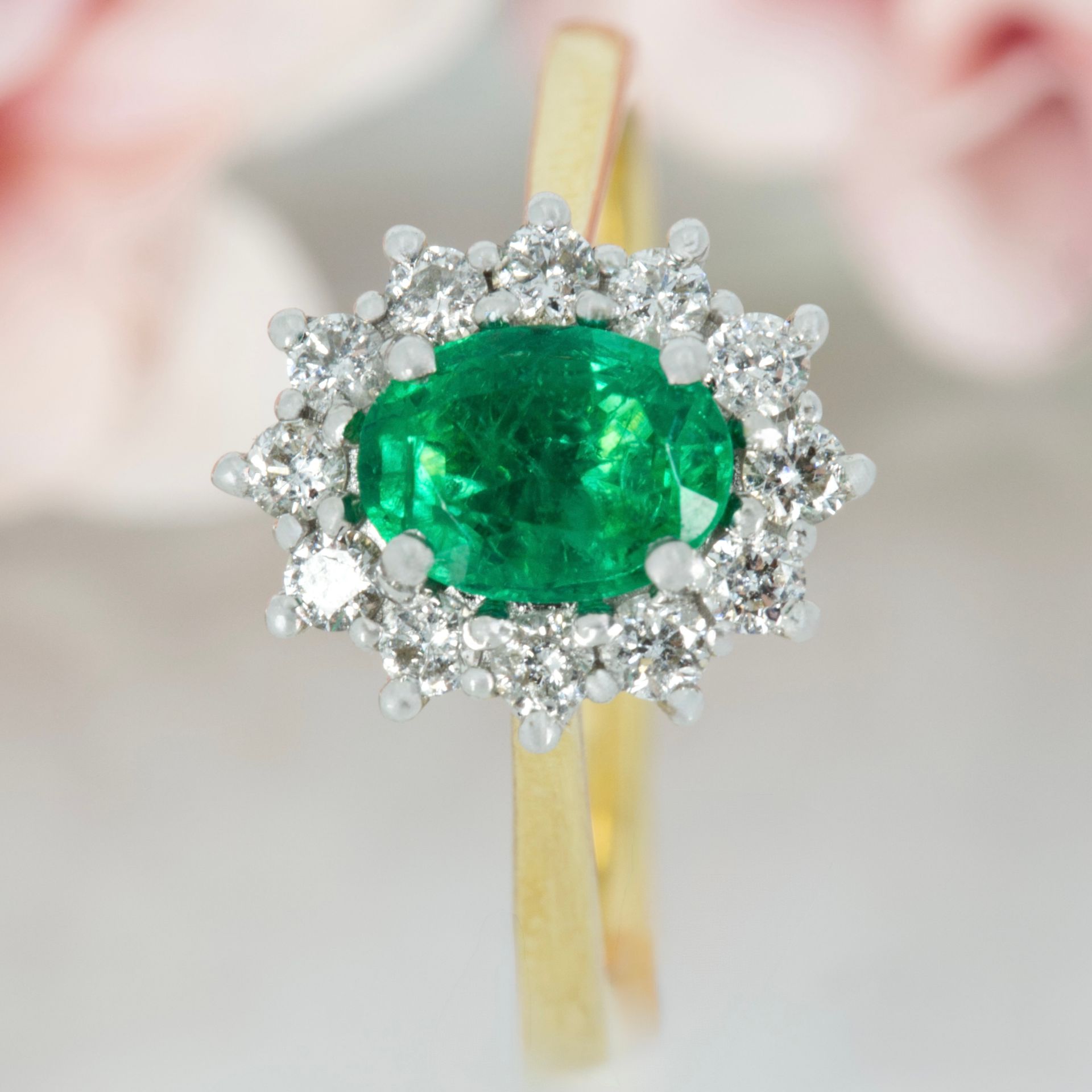 18ct Yellow Gold Oval Cut Emerald & Round Brilliant Cut Diamond Cluster Ring