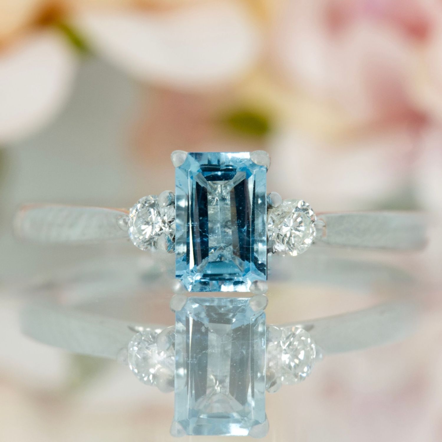 Platinum Octagonal Cut Aquamarine & Round Brilliant Cut Diamond Trilogy Ring