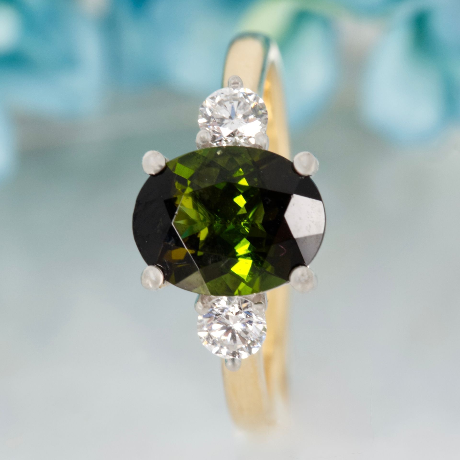 18ct Yellow Gold & Platinum Oval Cut Green Tourmaline & Round Brilliant Cut Diamond Trilogy Ring