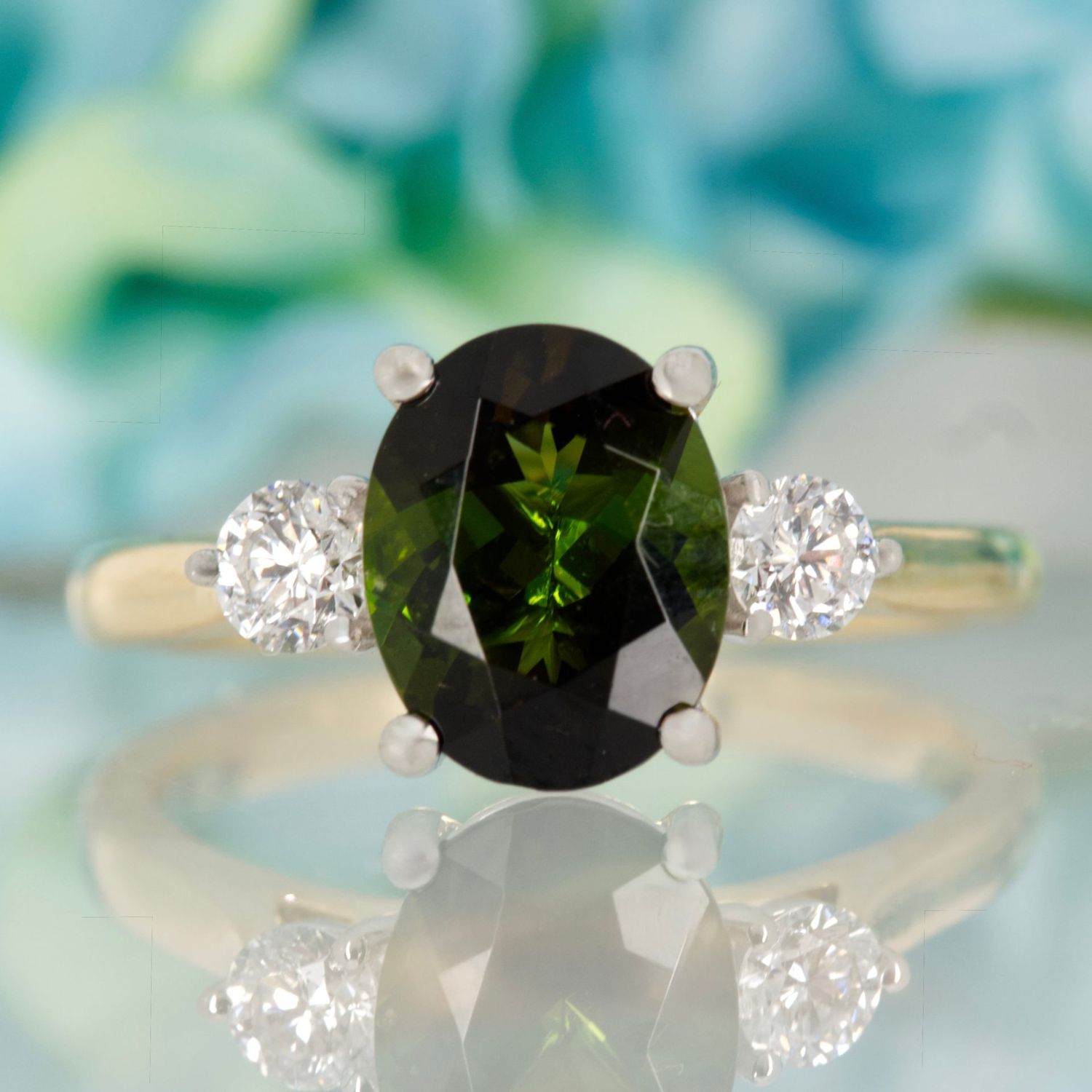 18ct Yellow Gold & Platinum Oval Cut Green Tourmaline & Round Brilliant Cut Diamond Trilogy Ring