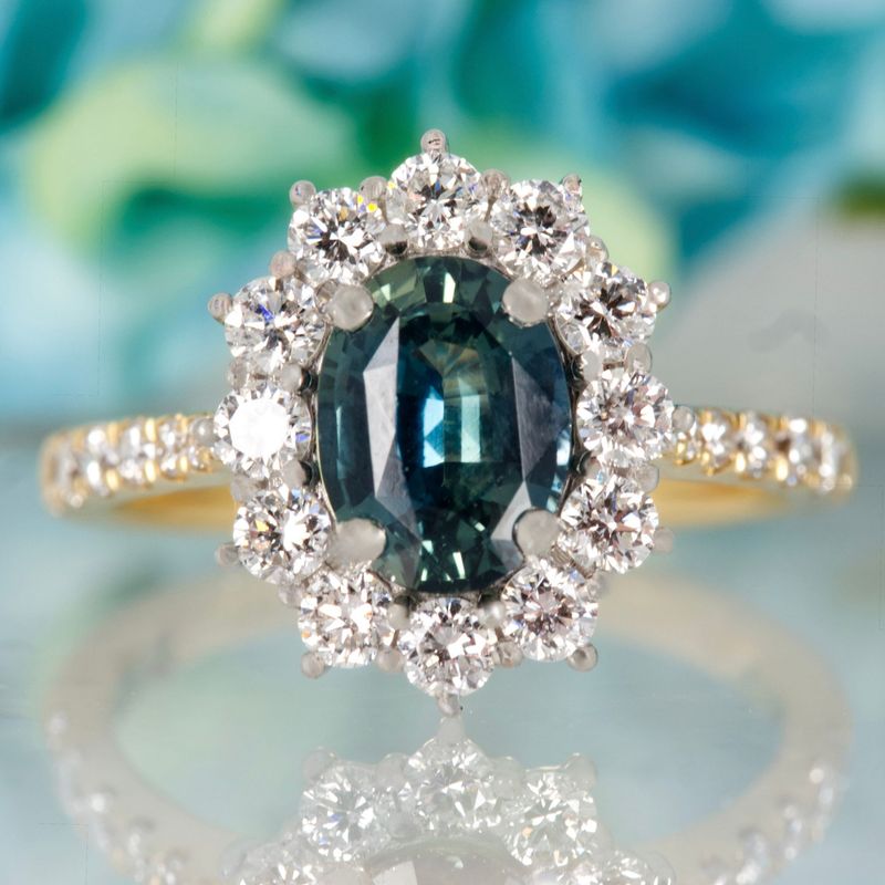 18ct Yellow Gold & Platinum Oval Cut Teal Sapphire & Round Brilliant Cut Diamond Cluster Ring