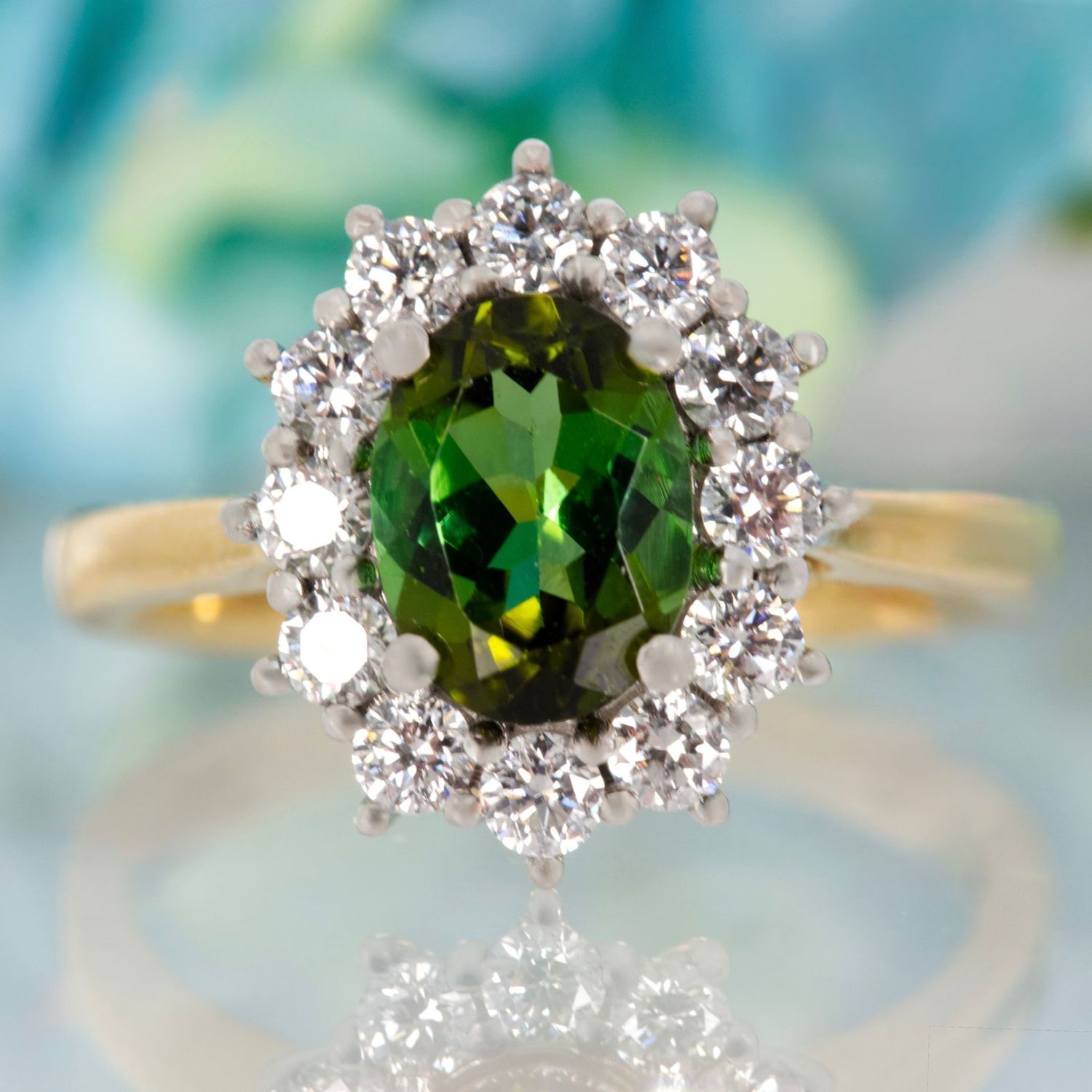 18ct Yellow Gold & Platinum Oval Cut Green Tourmaline & Round Brilliant Cut Diamond Cluster Ring