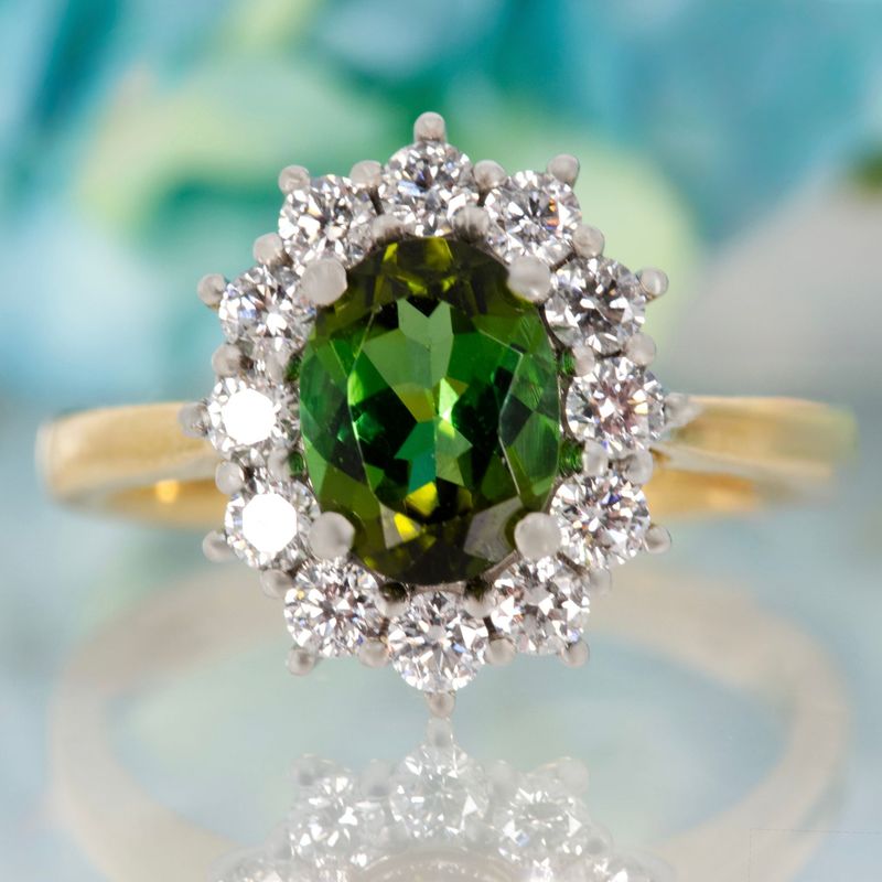 18ct Yellow Gold & Platinum Oval Cut Green Tourmaline & Round Brilliant Cut Diamond Cluster Ring