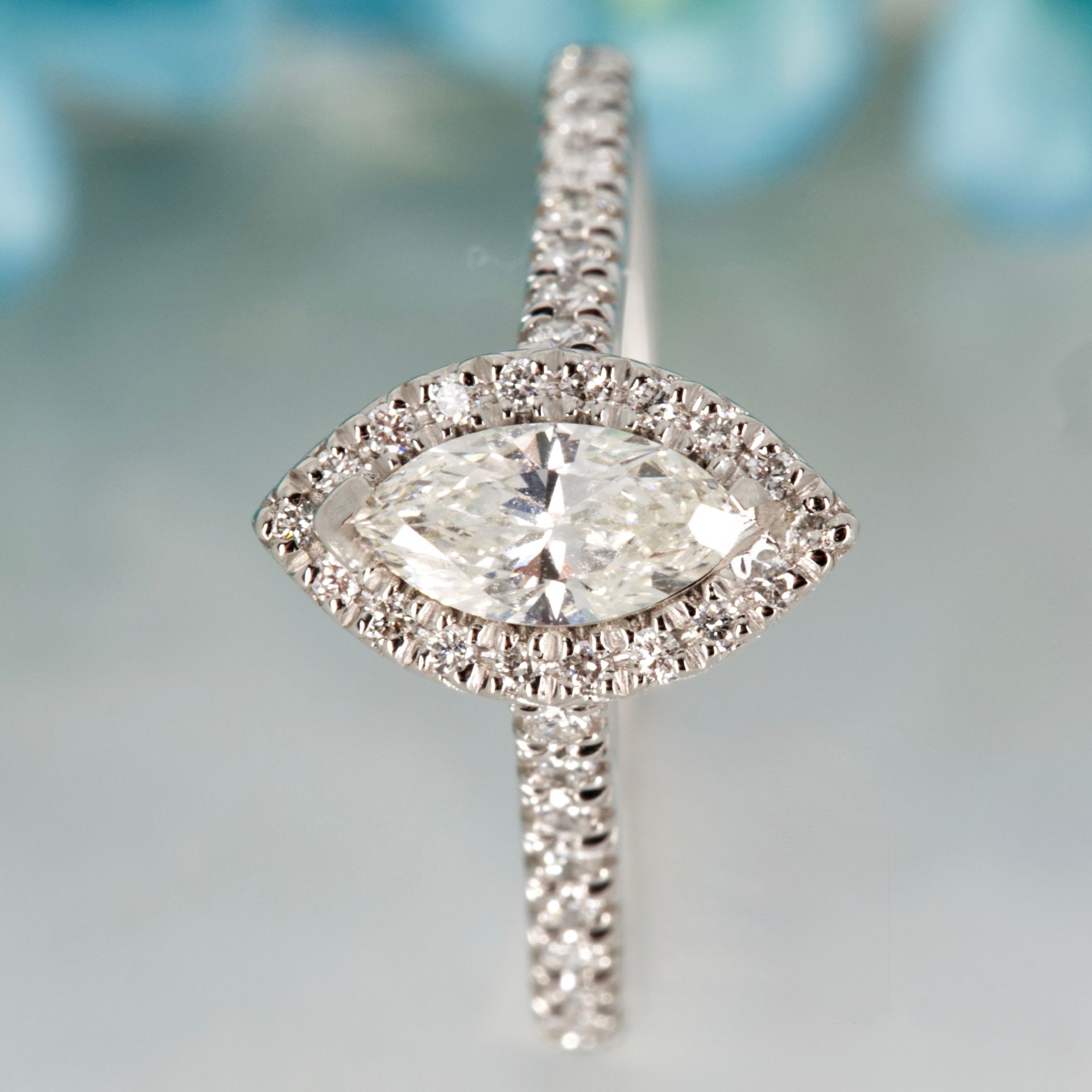 Platinum GIA Certified Marquise Cut Diamond & Round Brilliant Cut Diamond Halo Cluster Ring