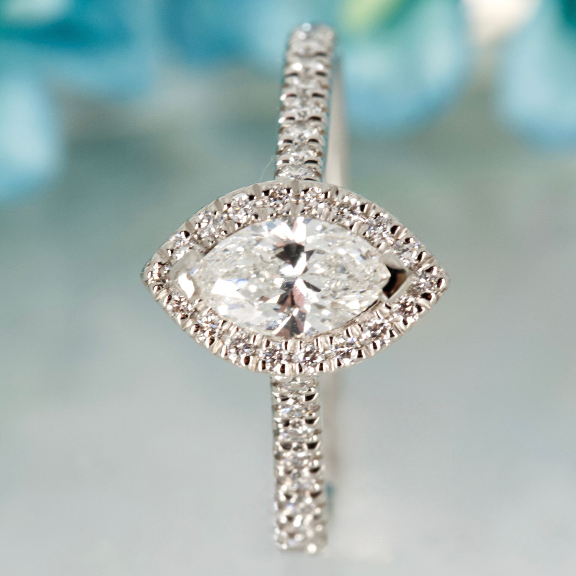 Platinum GIA Certified Marquise Cut Diamond & Round Brilliant Cut Diamond Halo Cluster Ring