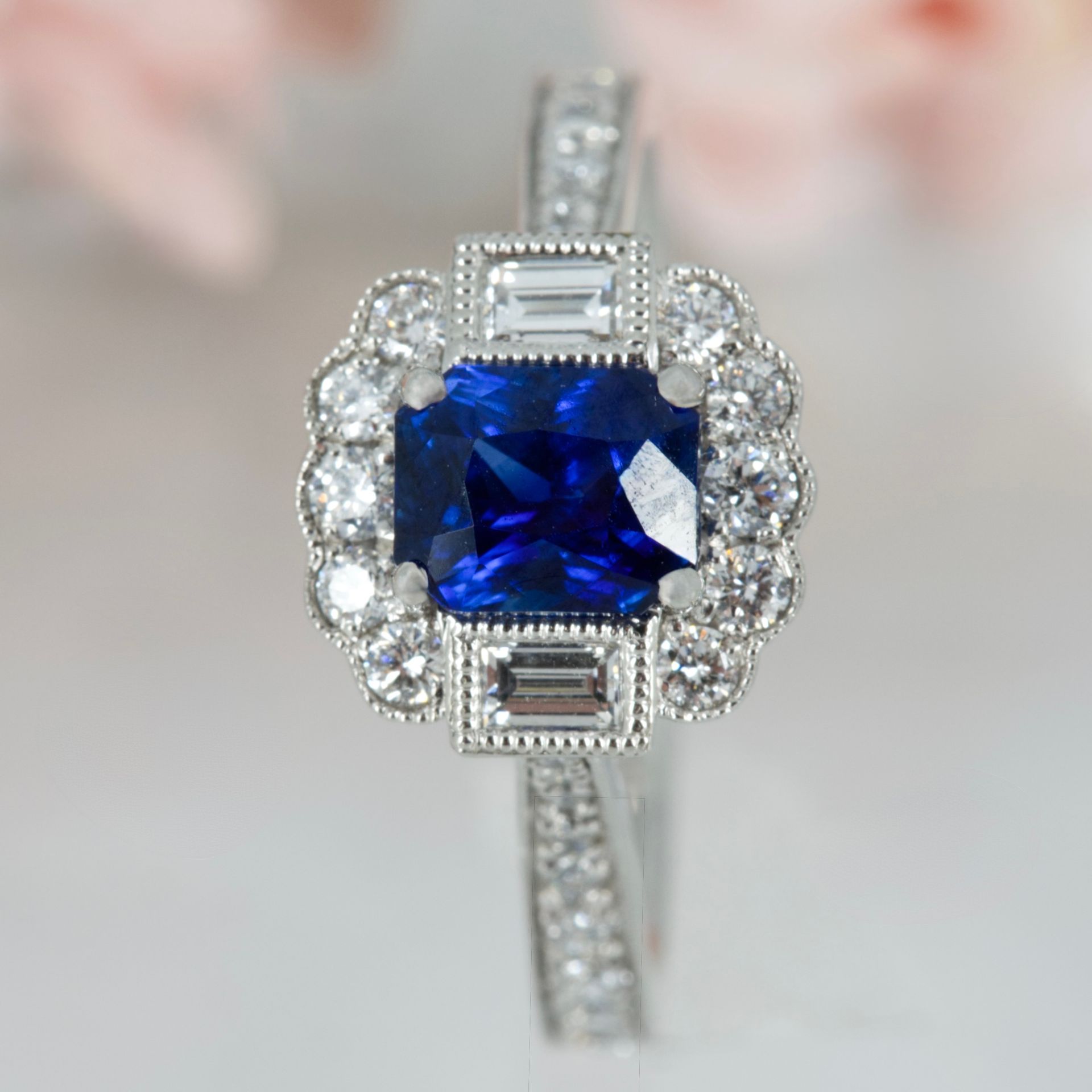 Platinum Octagonal Cut Sapphire & Baguette and Round Brilliant Cut Diamond Cluster Ring