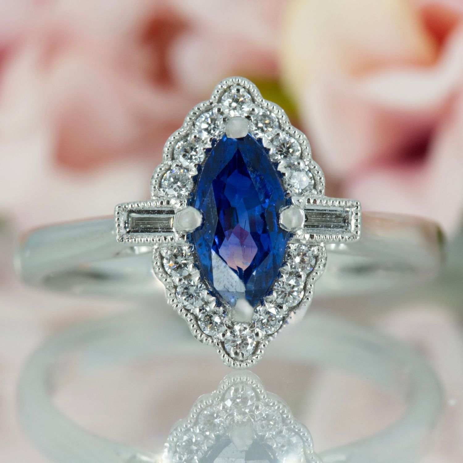 Platinum Marquise Cut Sapphire & Baguette and Round Brilliant Cut Diamond Cluster Ring