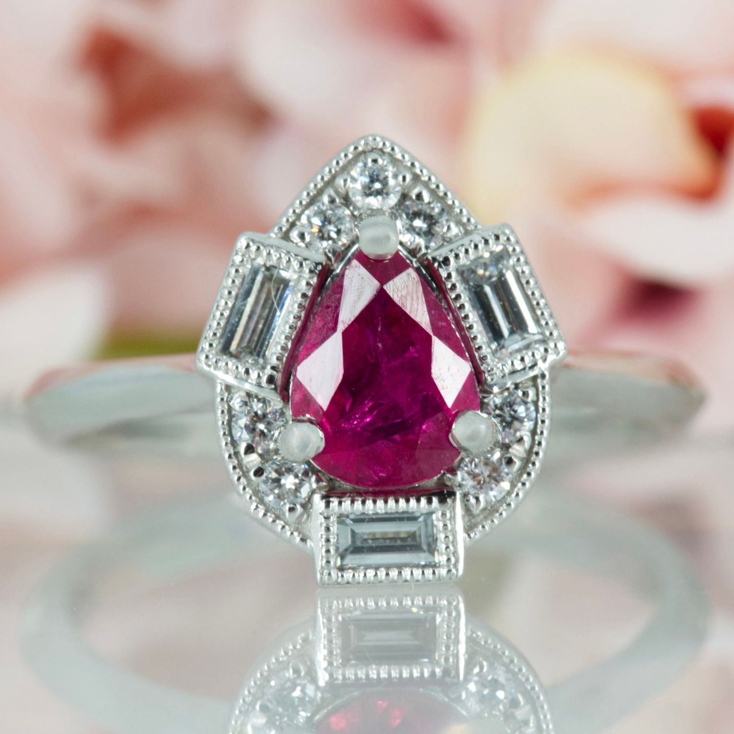 Platinum Pear Cut Ruby & Baguette and Round Brilliant Cut Diamond Cluster Ring