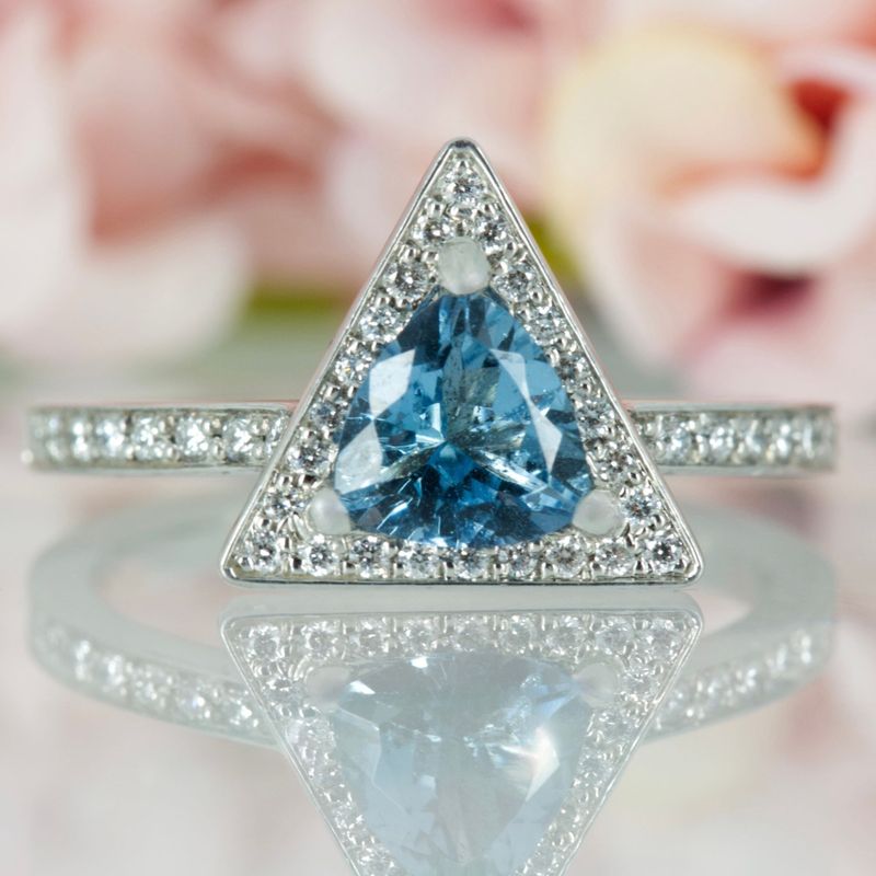 Platinum Trilliant Cut Aquamarine & Round Brilliant Cut Diamond Halo Cluster Ring