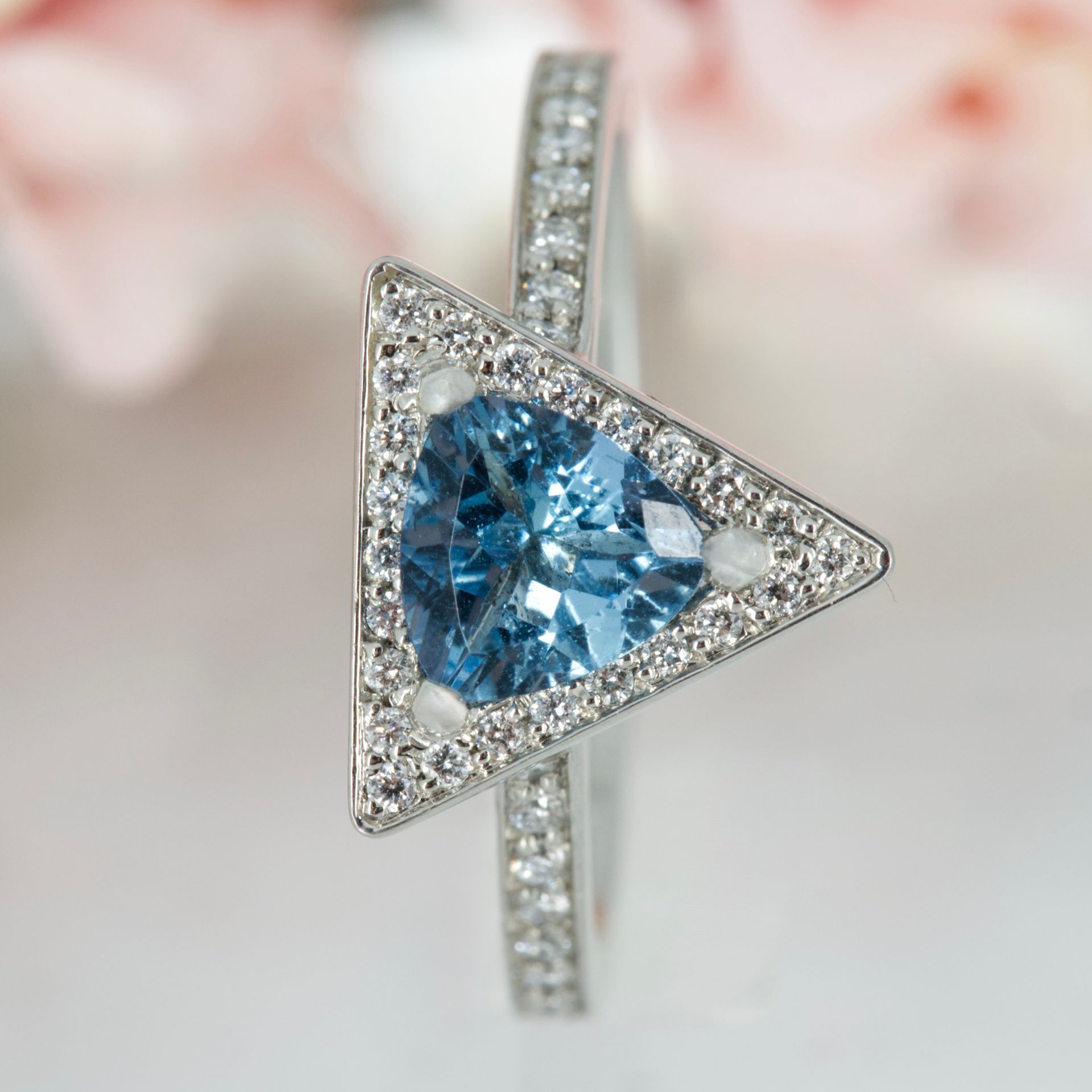 Platinum Trilliant Cut Aquamarine & Round Brilliant Cut Diamond Halo Cluster Ring
