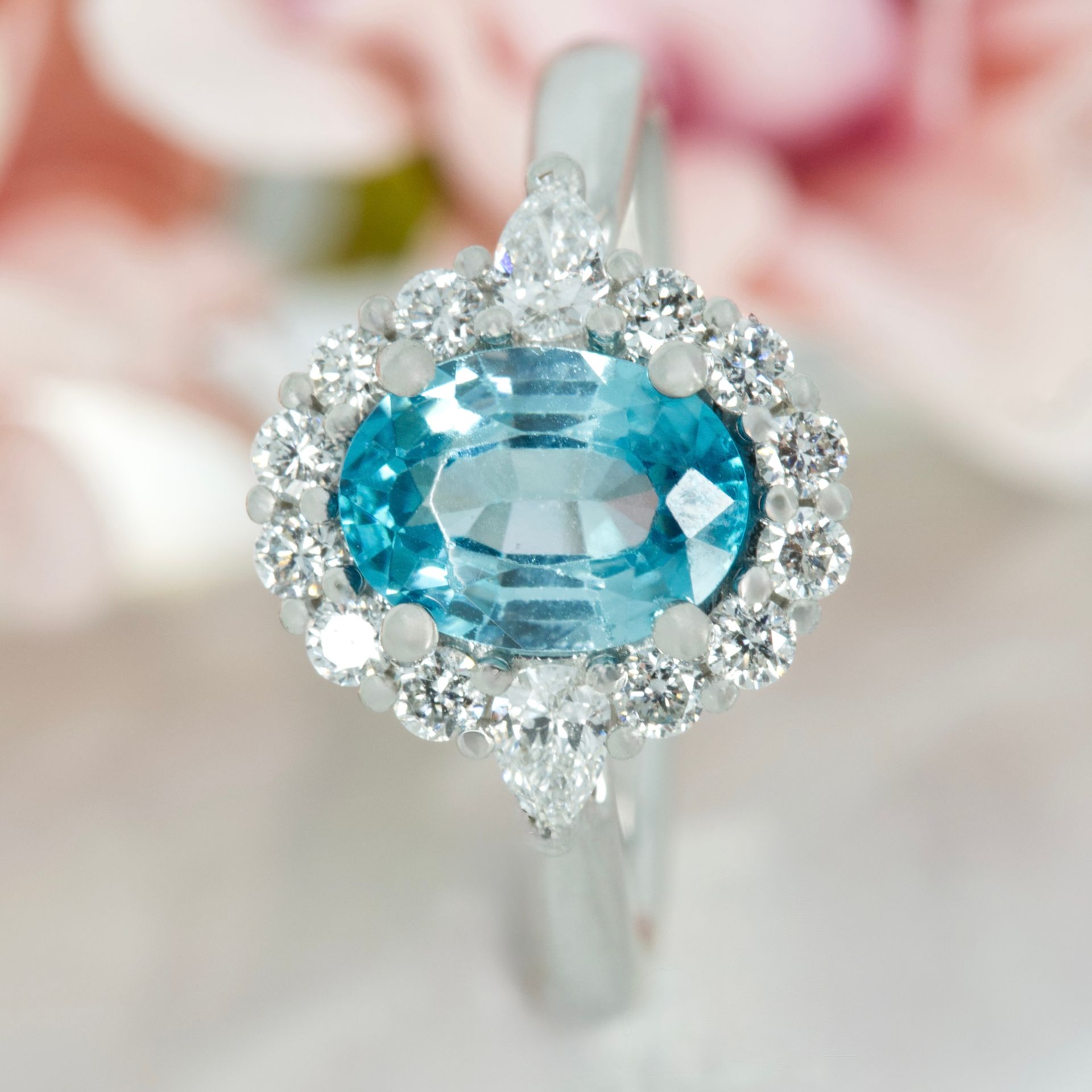 Platinum Oval Cut Blue Zircon & Pear and Round Brilliant Cut Diamond Cluster Ring