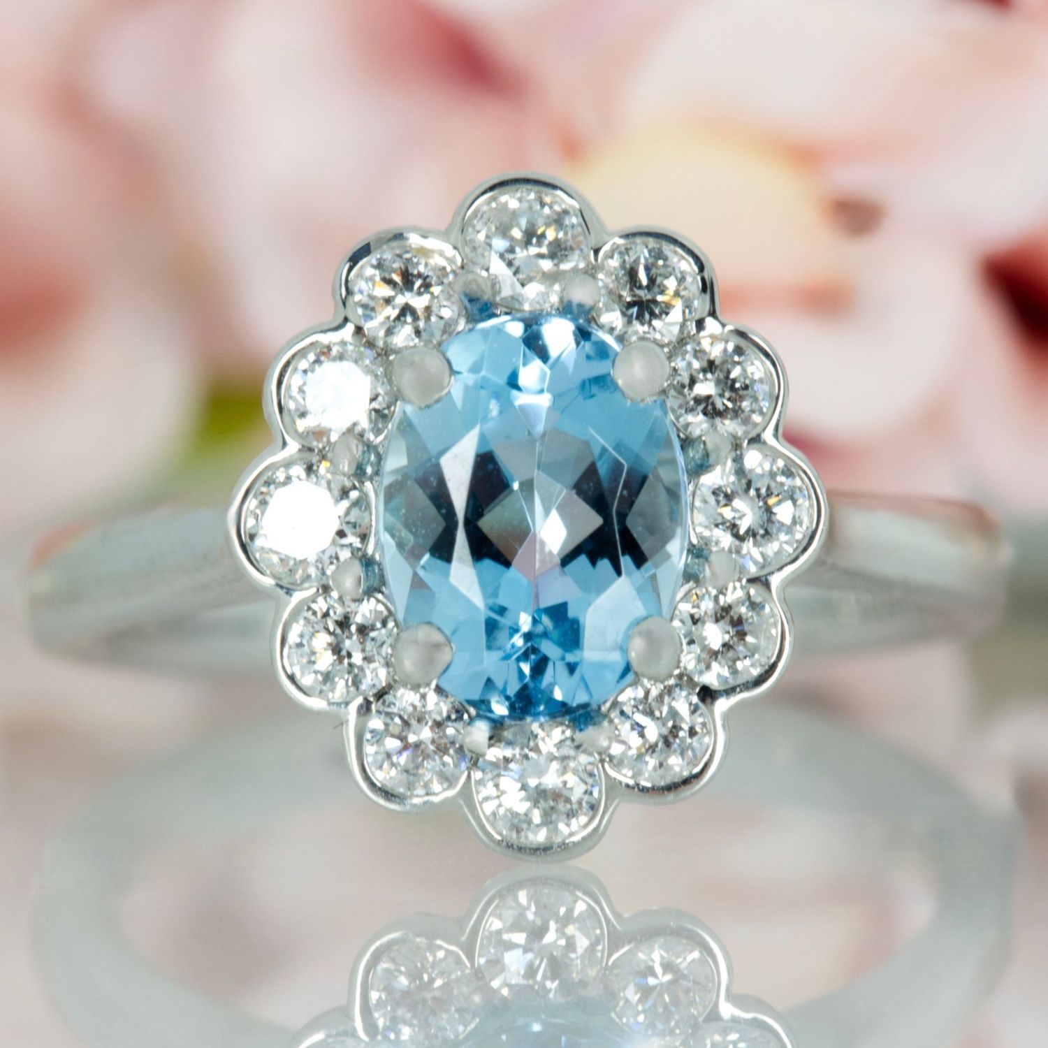 Platinum Oval Cut Aquamarine & Round Brilliant Cut Diamond Cluster Ring
