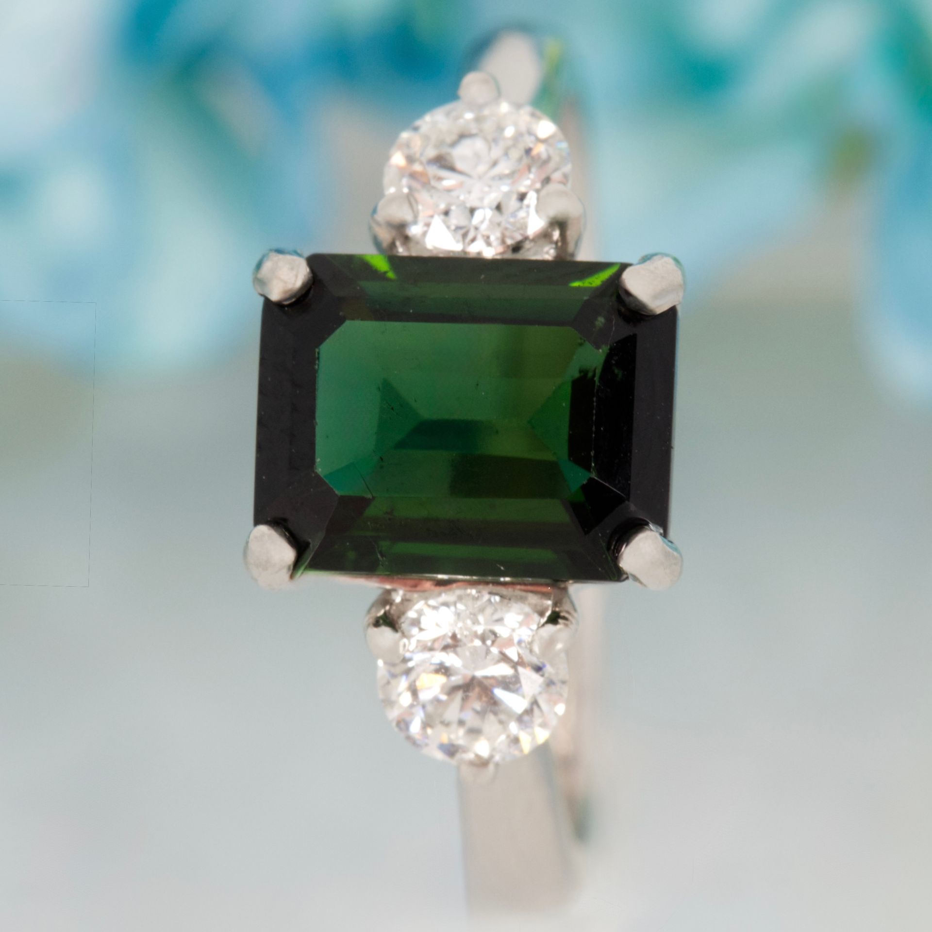 Platinum Octagonal Cut Green Tourmaline & Round Brilliant Cut Diamond Trilogy Ring