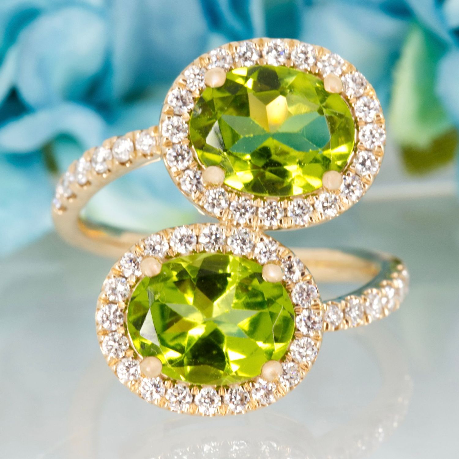 9ct Yellow Gold Oval Cut Peridot & Round Brilliant Cut Diamond Halo Cluster Crossover Ring 9ct Yellow Gold Oval Cut Peridot & Round Brilliant Cut Diamond Halo Cluster Crossover Ring