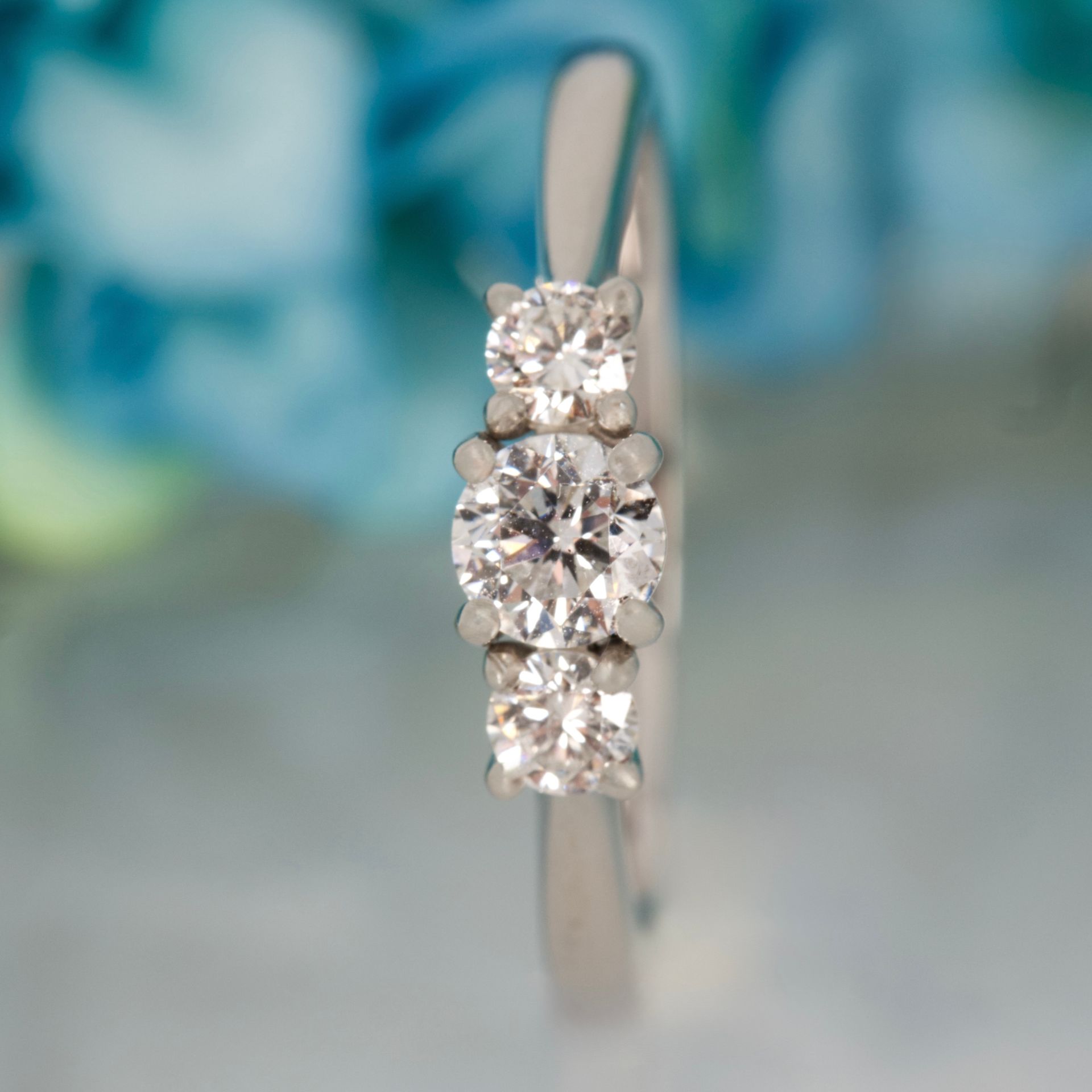 Platinum 0.50ct Round Brilliant Cut Diamond Claw Set Trilogy Ring