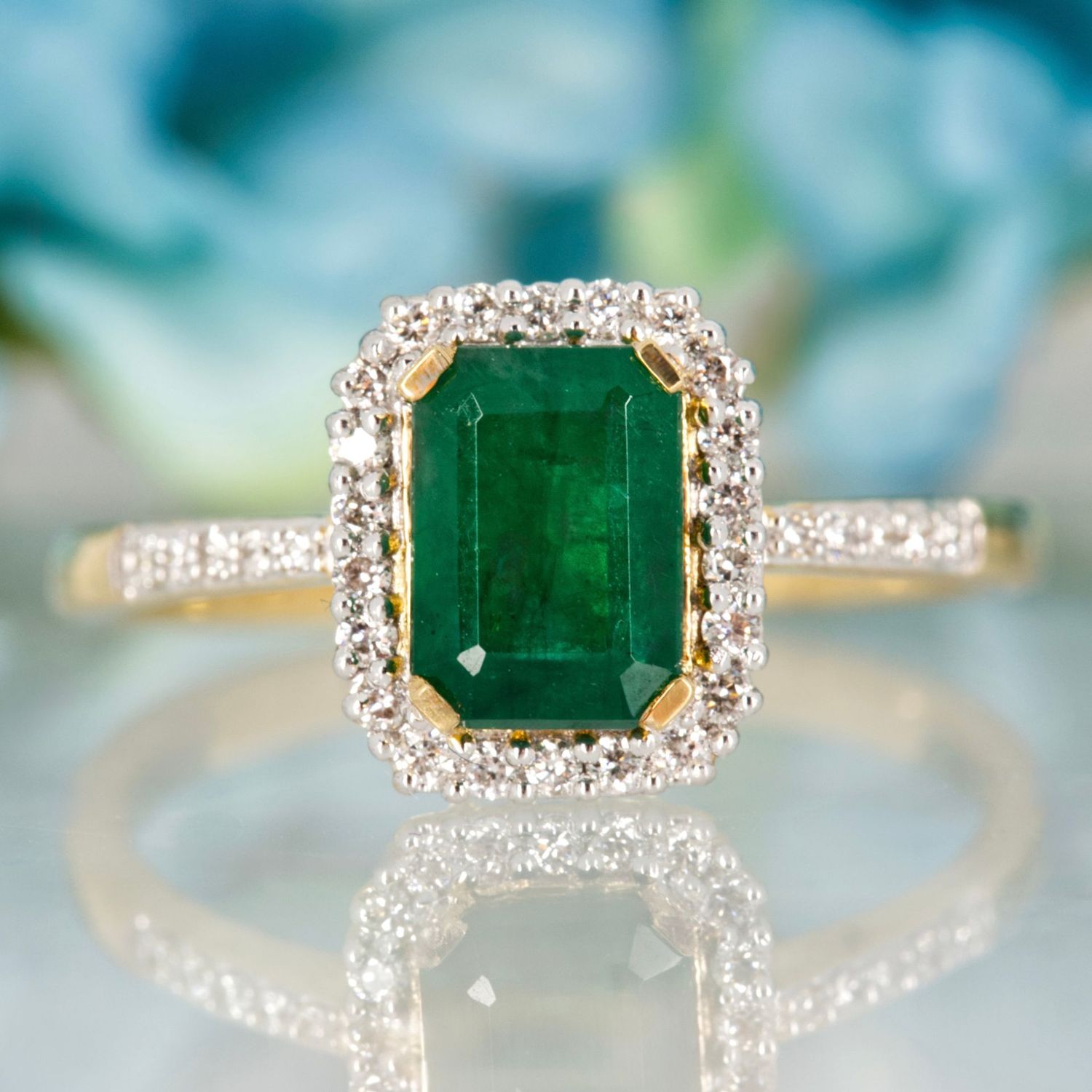 18ct Yellow Gold Octagonal Cut Emerald & Round Brilliant Cut Diamond Halo Cluster Ring