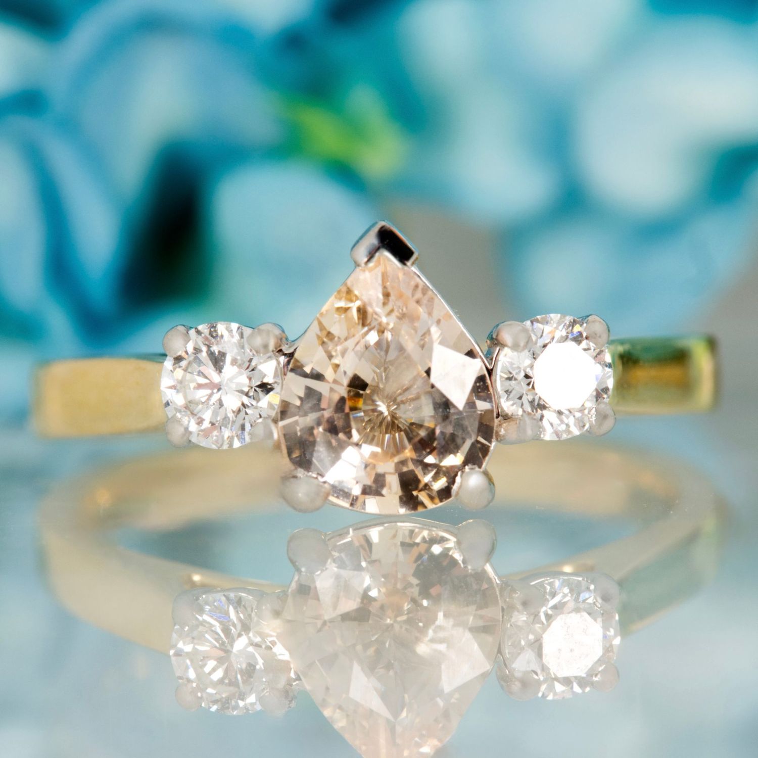 18ct Yellow Gold Pear Cut Blush Sapphire & Round Brilliant Cut Diamond Trilogy Ring