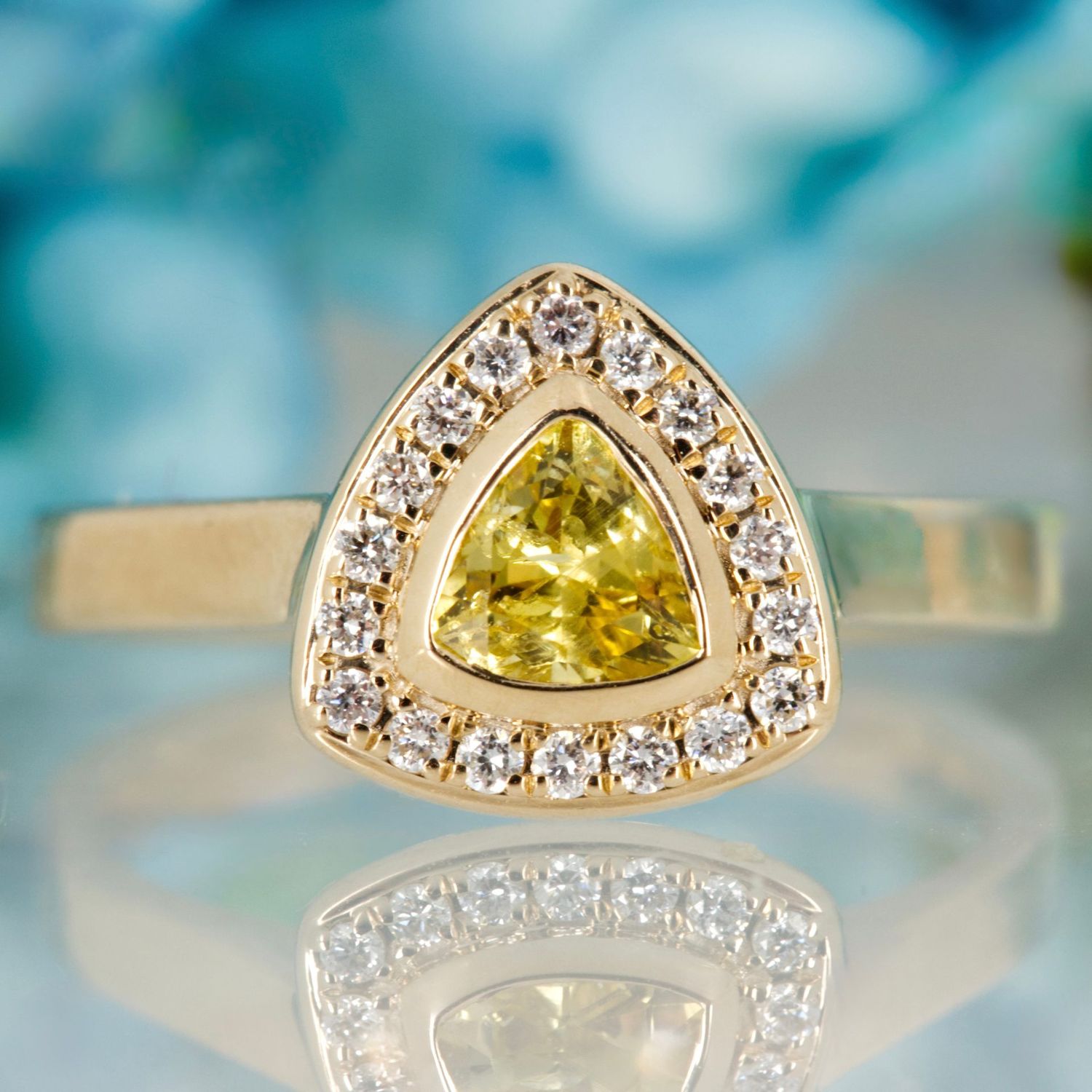9ct Yellow Gold Trilliant Cut Yellow Sapphire & Round Brilliant Cut Diamond Halo Cluster Ring