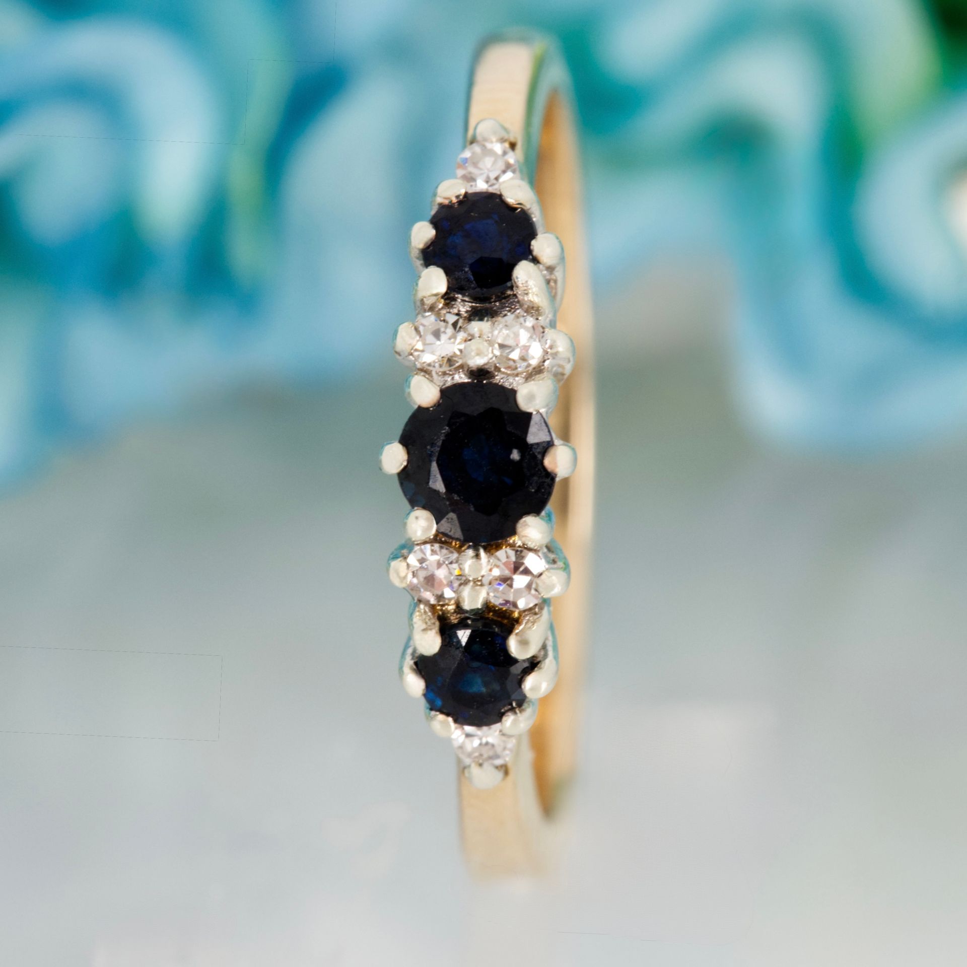 Pre-Loved 9ct Yellow Gold Round Cut Sapphire & Round Brilliant Cut Diamond Half Eternity Ring