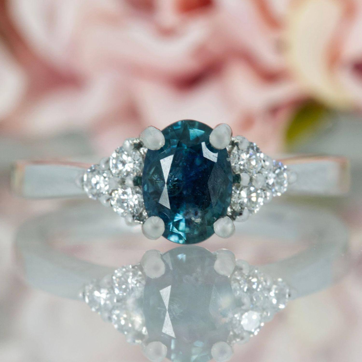 Platinum Oval Cut Montana Blue Sapphire & Round Brilliant Cut Diamond Trefoil Ring