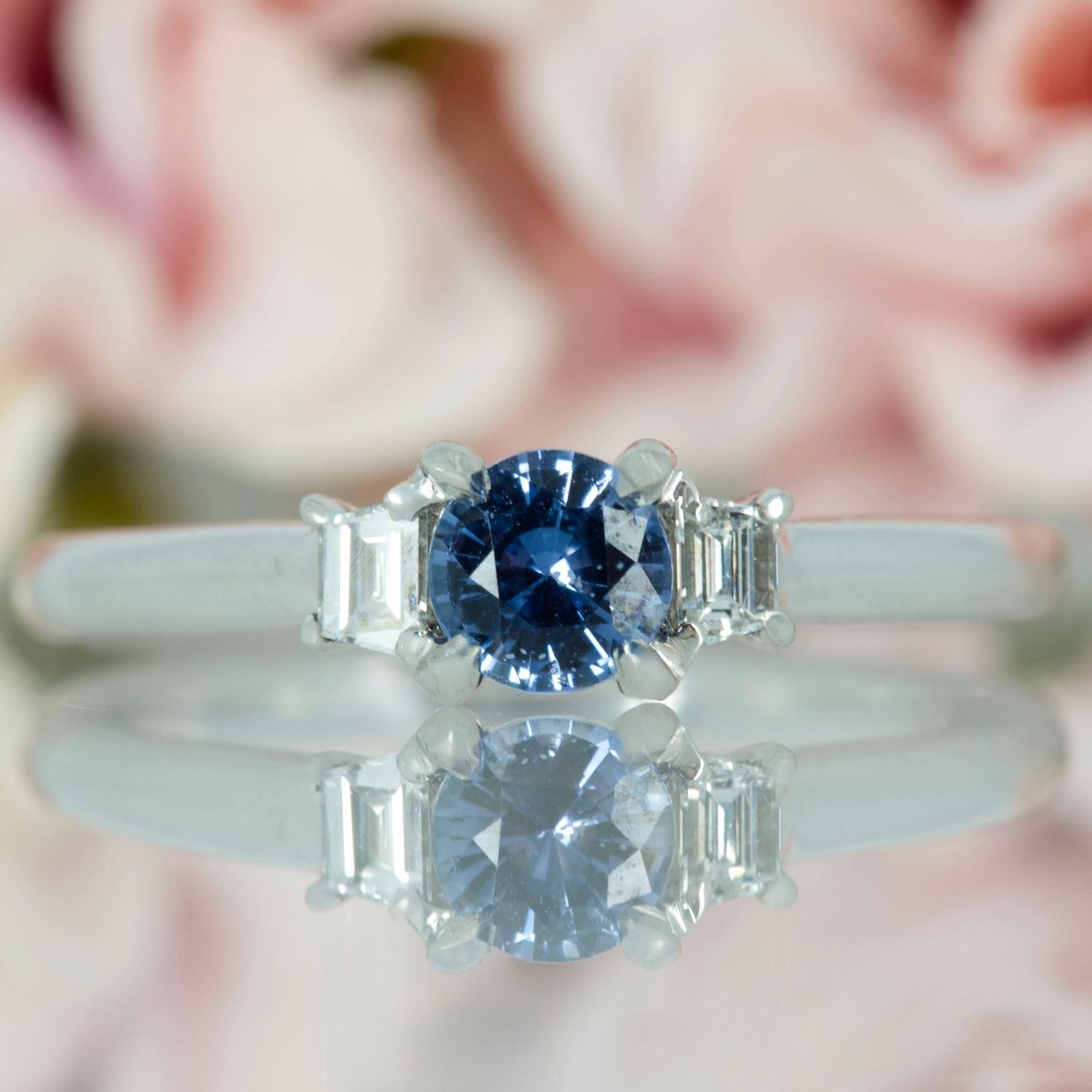 Platinum Round Cut Sapphire & Trapezoid Cut Diamond Trilogy Ring