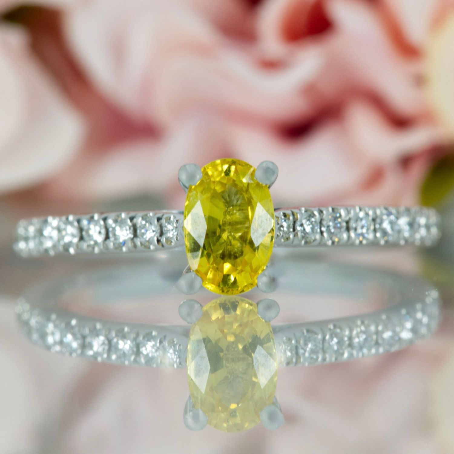 Platinum Oval Cut Yellow Sapphire & Round Brilliant Cut Diamond Ring