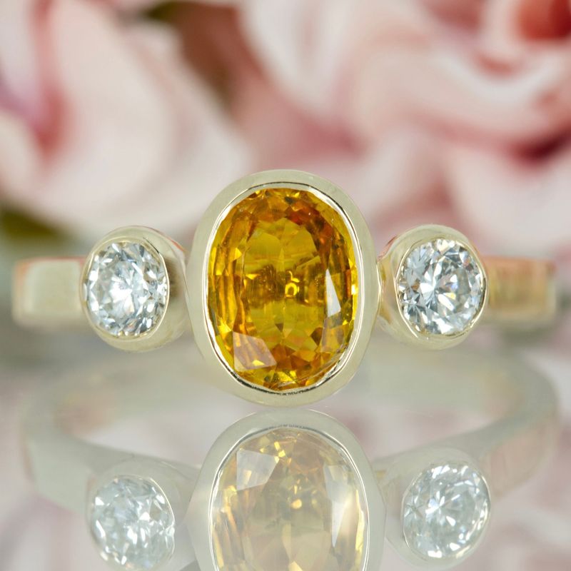 9ct Yellow Gold Oval Cut Yellow Sapphire & Round Brilliant Cut Diamond Trilogy Ring