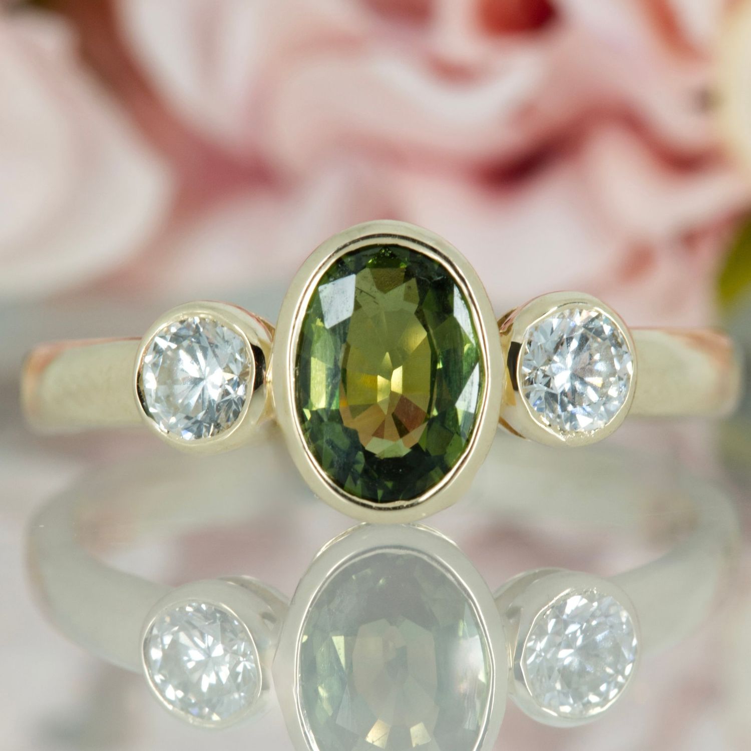9ct Yellow Gold Oval Cut Green Sapphire & Round Brilliant Cut Diamond Trilogy Ring 9ct Yellow Gold Oval Cut Green Sapphire & Round Brilliant Cut Diamond Trilogy Ring