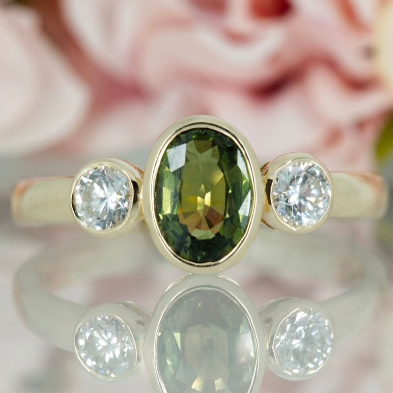 9ct Yellow Gold Oval Cut Green Sapphire & Round Brilliant Cut Diamond Trilogy Ring
