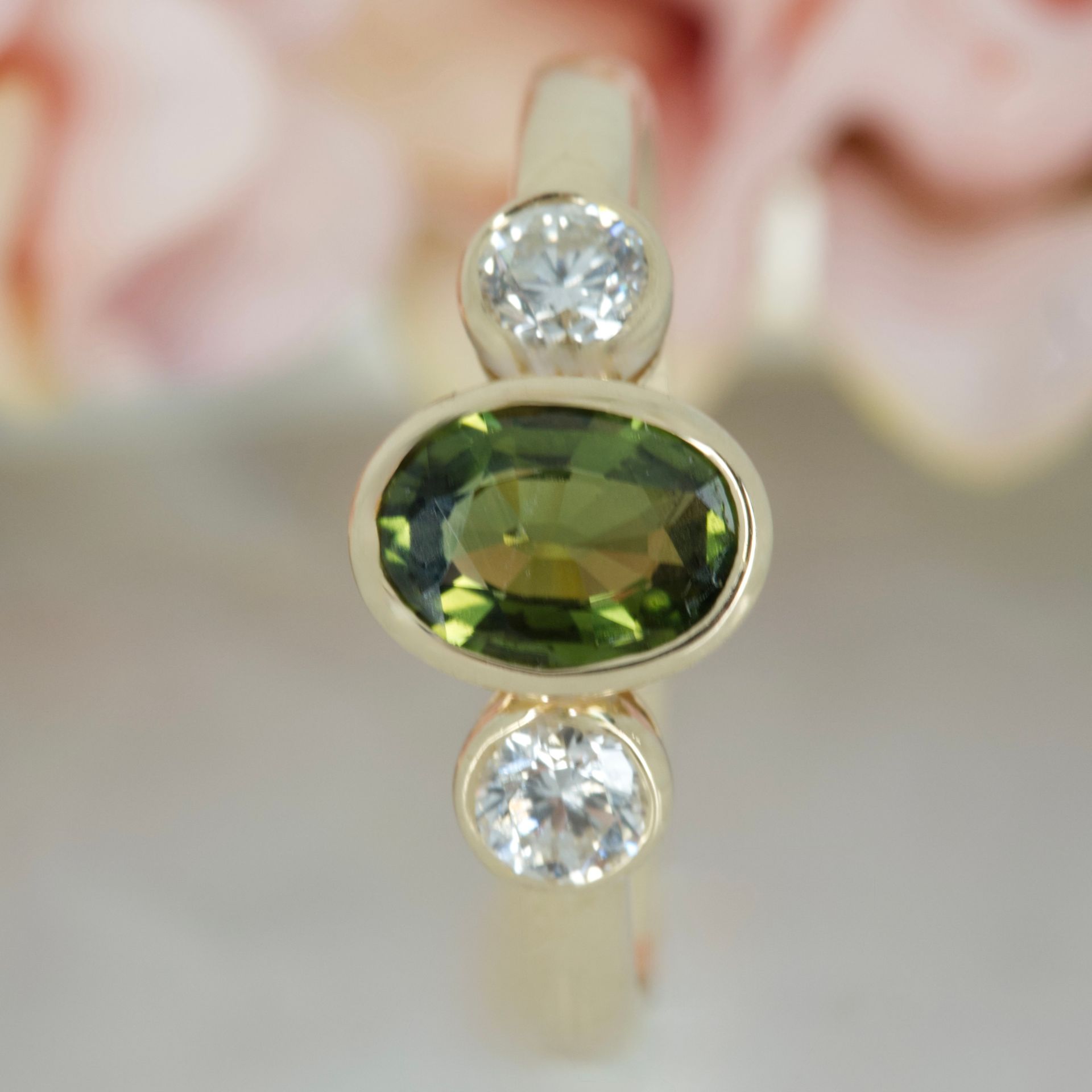 9ct Yellow Gold Oval Cut Green Sapphire & Round Brilliant Cut Diamond Trilogy Ring