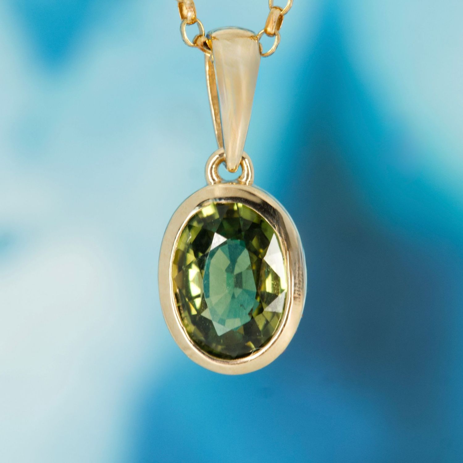 9ct Yellow Gold Oval Cut Green Sapphire Rub-Over Set Pendant & Chain