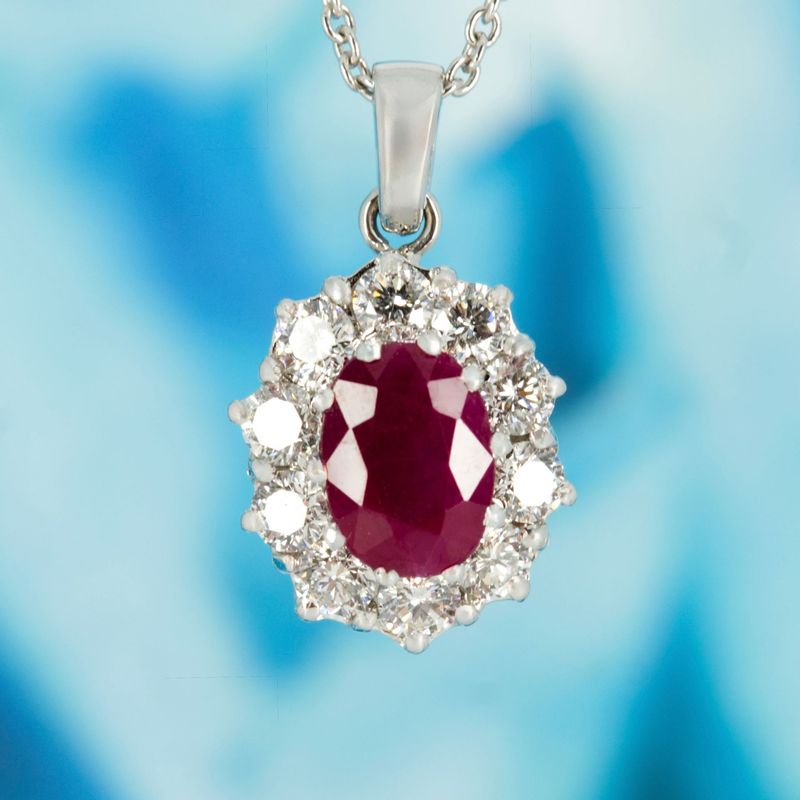 18ct White Gold Oval Cut Ruby & Round Brilliant Cut Diamond Cluster Pendant & Chain
