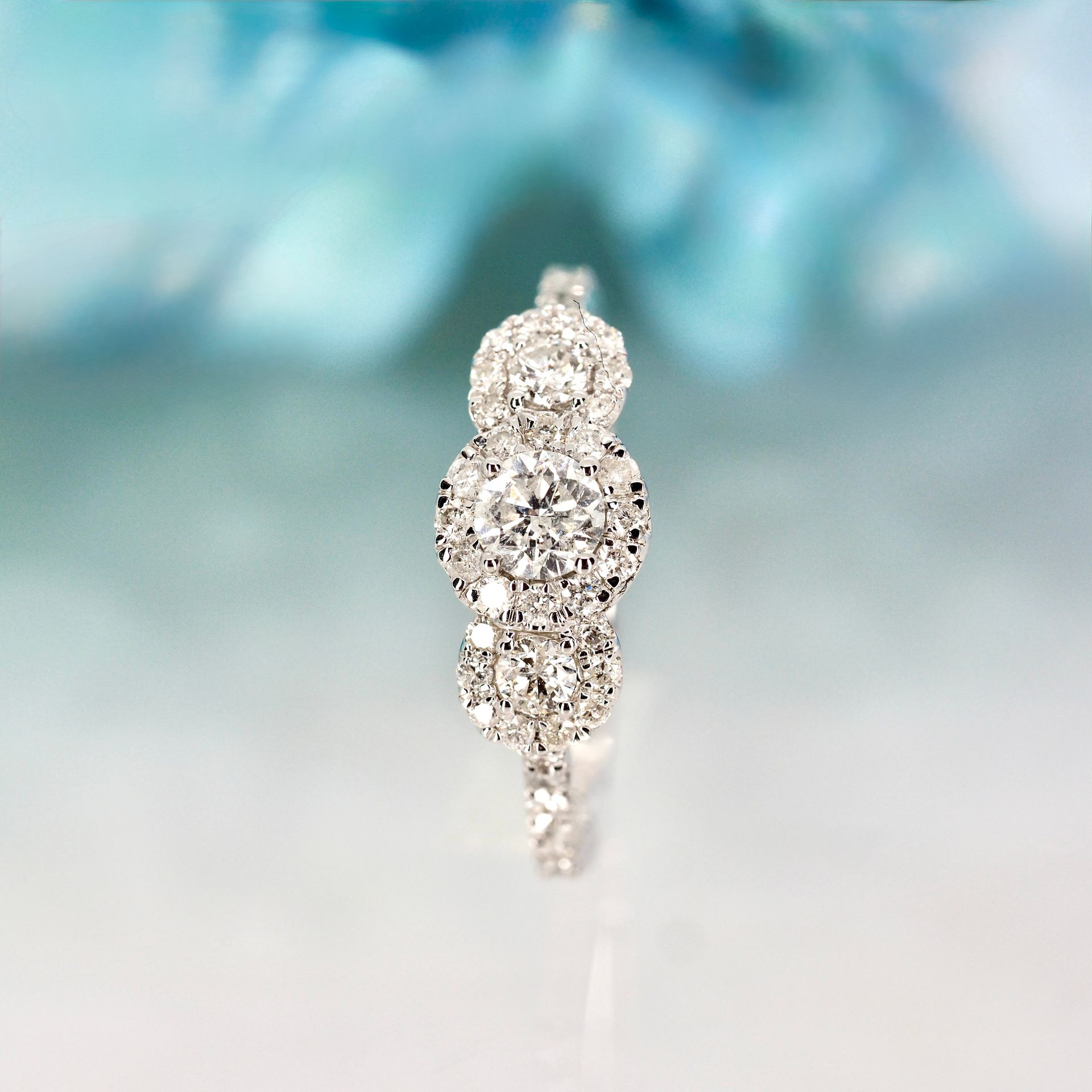 9ct White Gold 0.75ct Round Brilliant Cut Diamond Triple Halo Cluster Ring