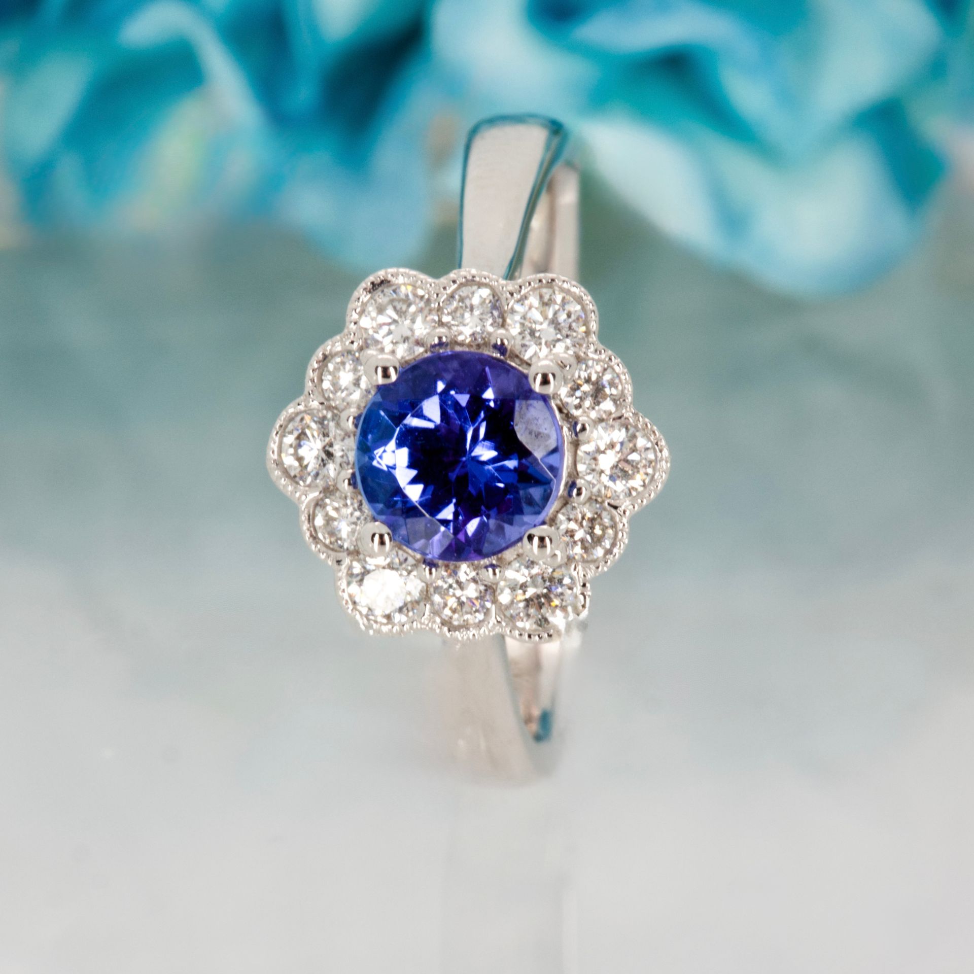 18ct White Gold Round Cut Tanzanite & Round Brilliant Cut Diamond Cluster Ring